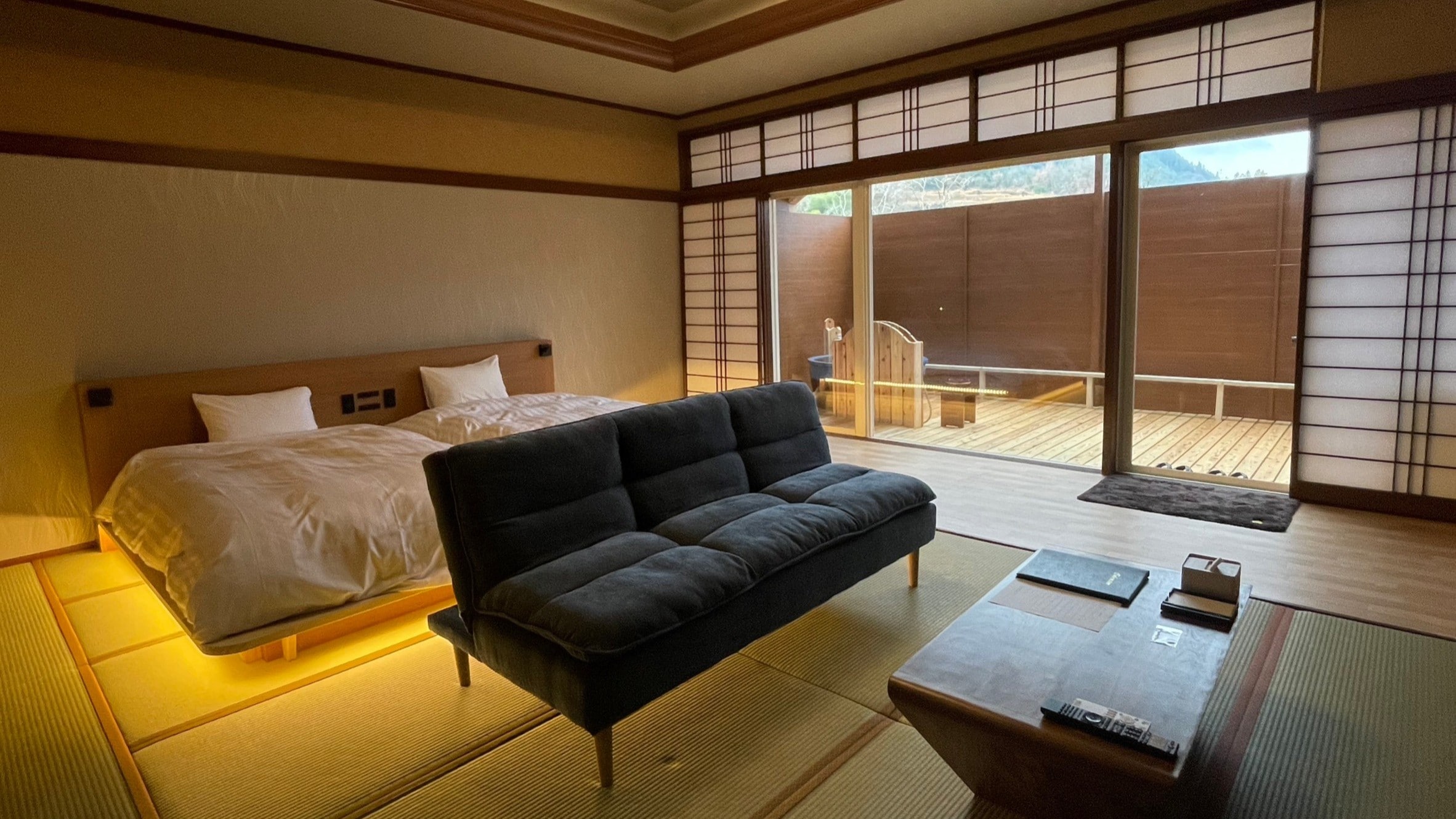 Image of a guest room with a semi-open-air bath