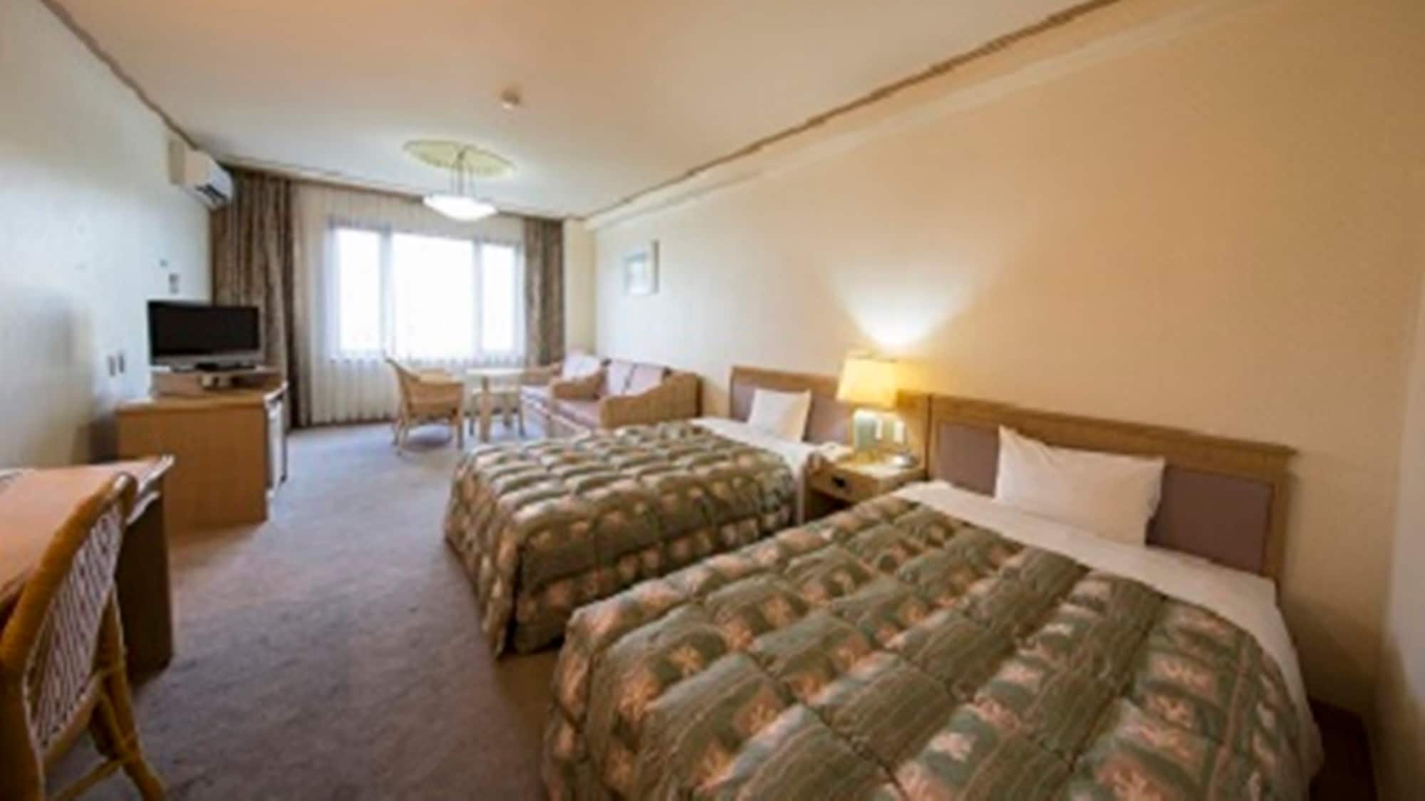 Example of a twin room in the main building