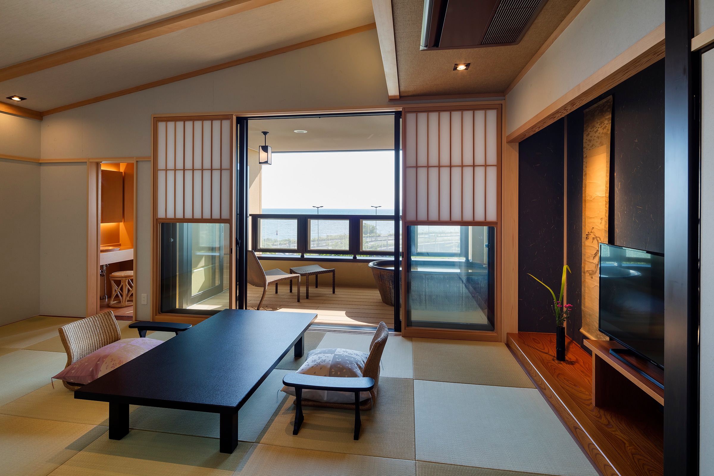 Guest room with bed Photo by Yasunori Shimomura