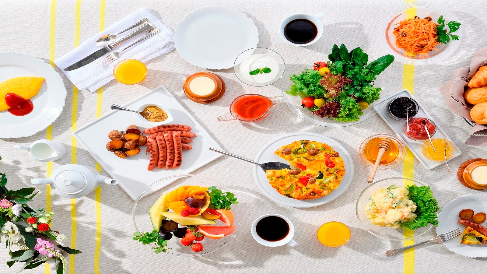 Freshly baked bread and delicious vegetables for breakfast