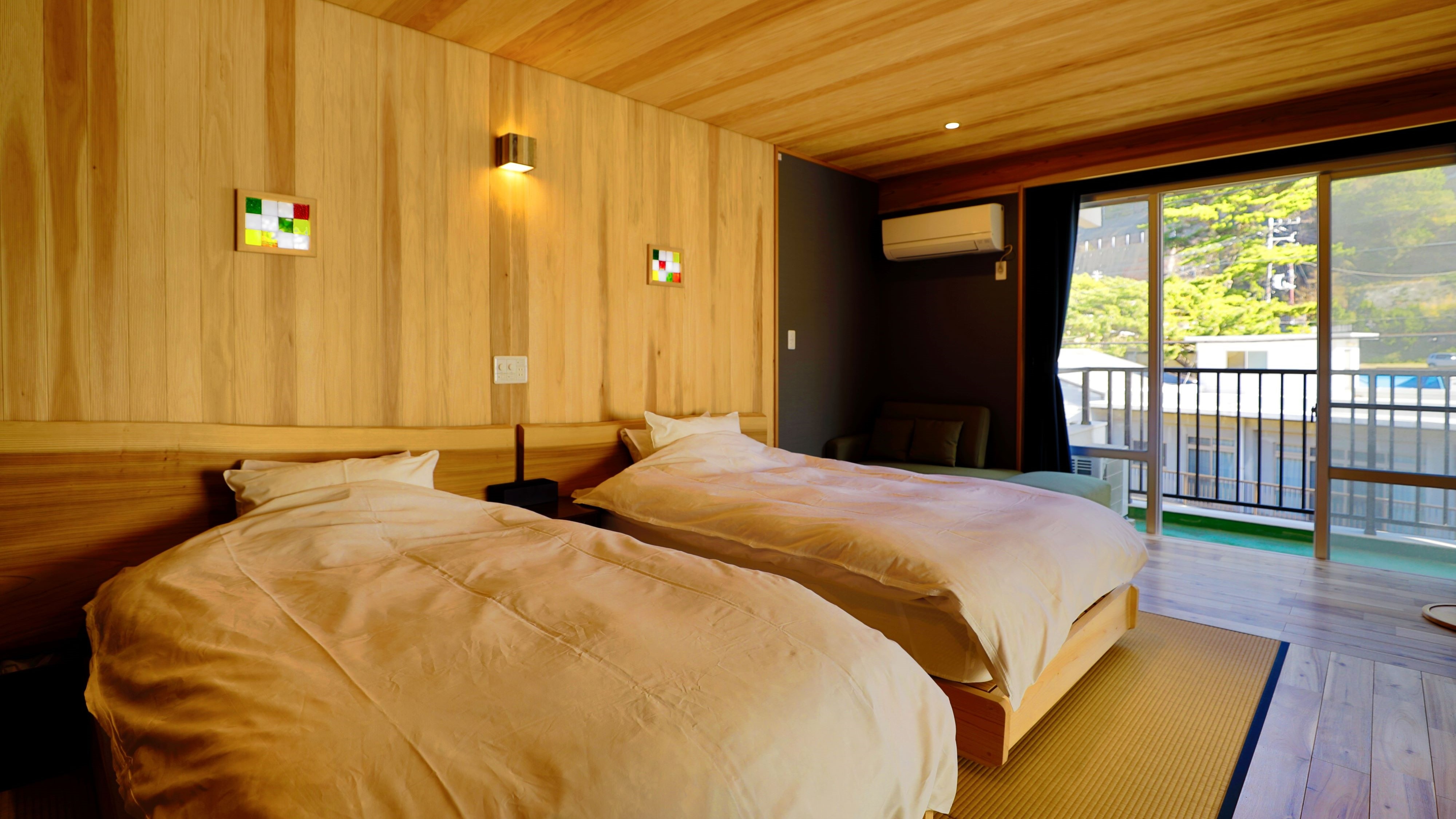 Newly renovated in 2021, this Japanese-Western style bedroom is equipped with two Simmons beds.