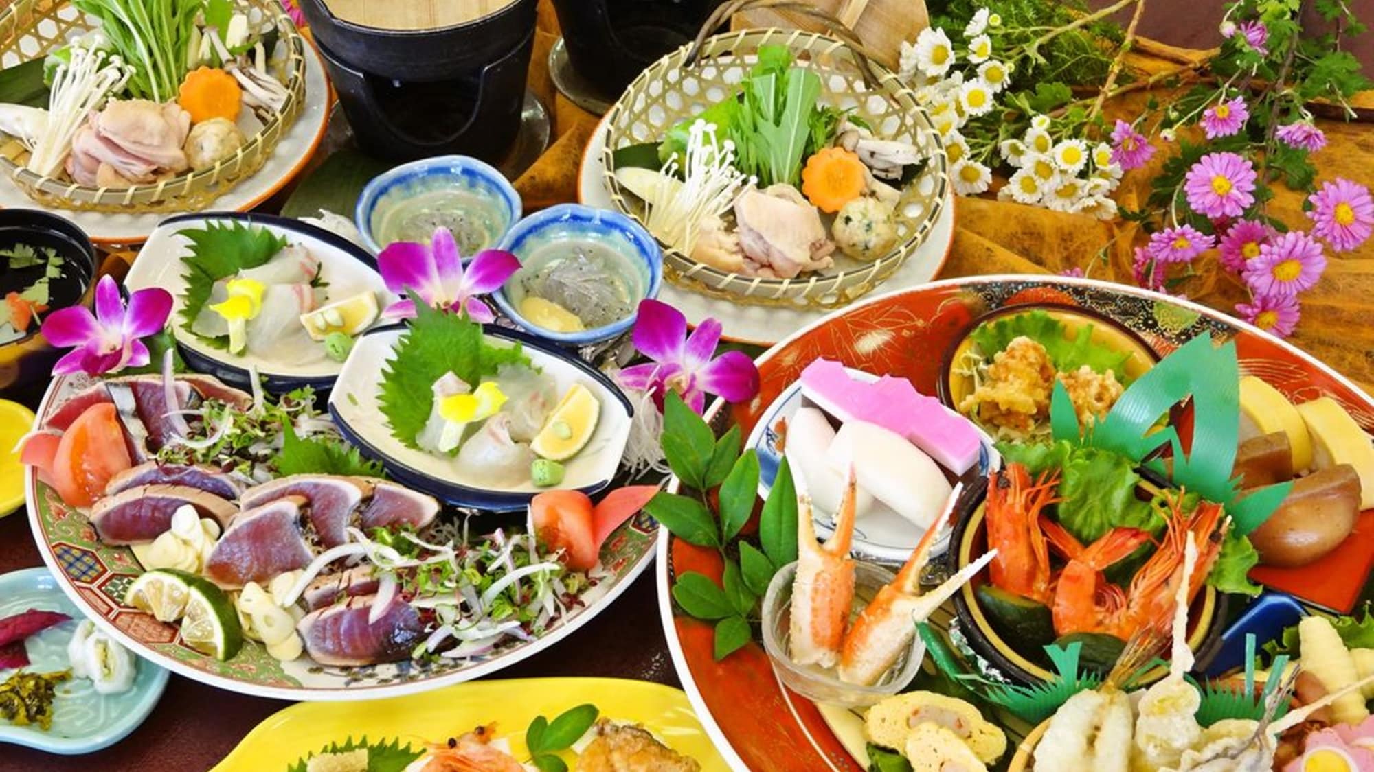 A hearty dish of assorted mountain and sea delicacies from Kochi Prefecture. *One example