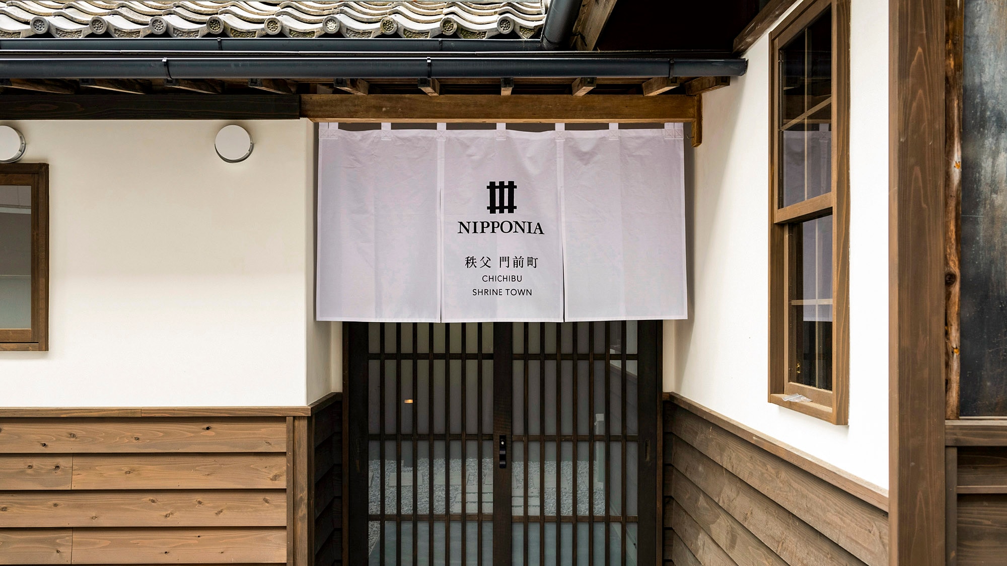 辦理入住手續的地點為 MARUJU 大樓。