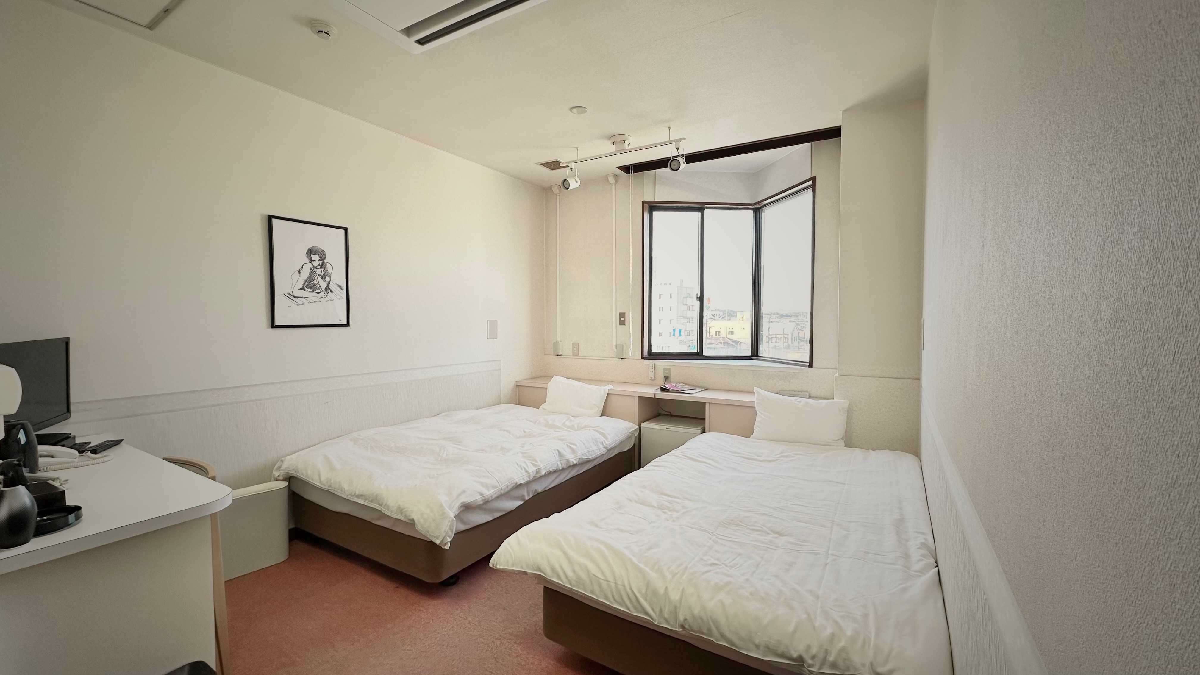 An example of a classic smoking twin room