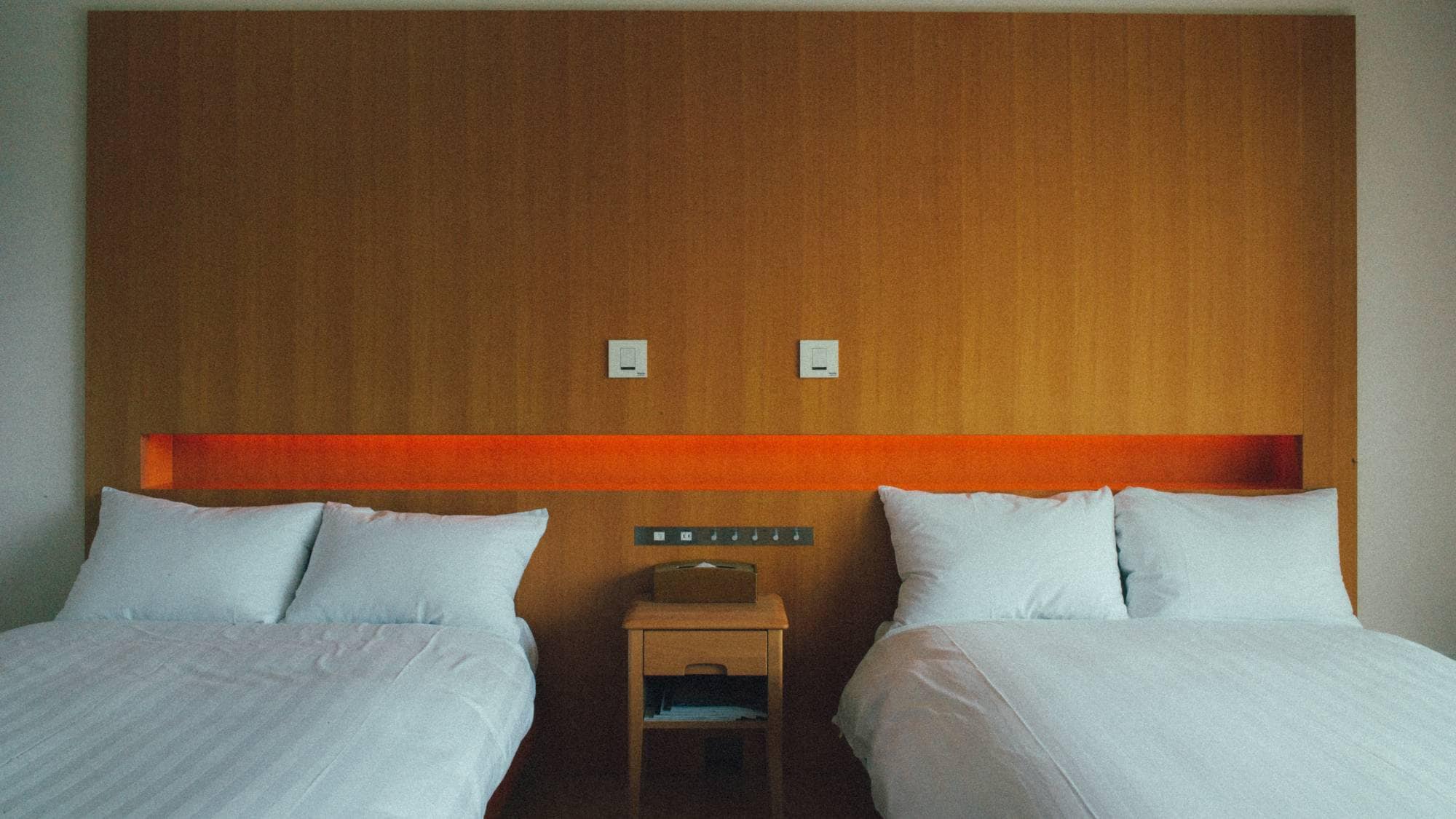 Lake view twin room bed area