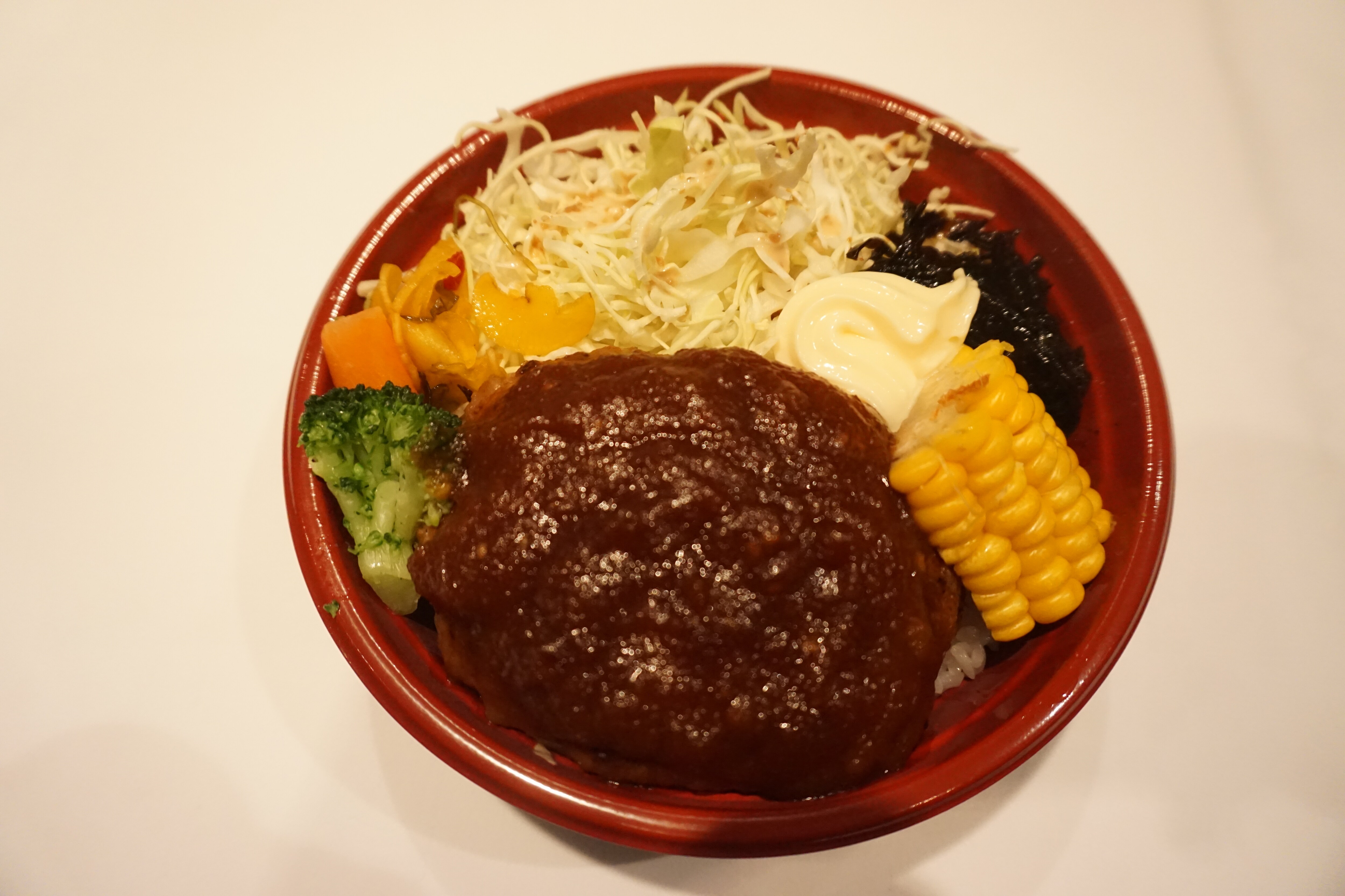 Bento with a selectable lunch plan (the photo is a hamburger steak)