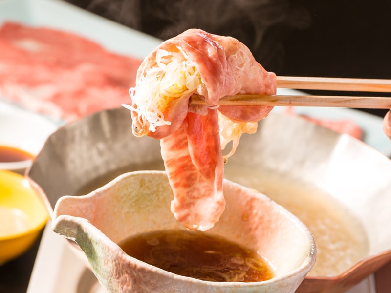 A5 grade Japanese black beef / Eat with soup stock and plenty of green onions