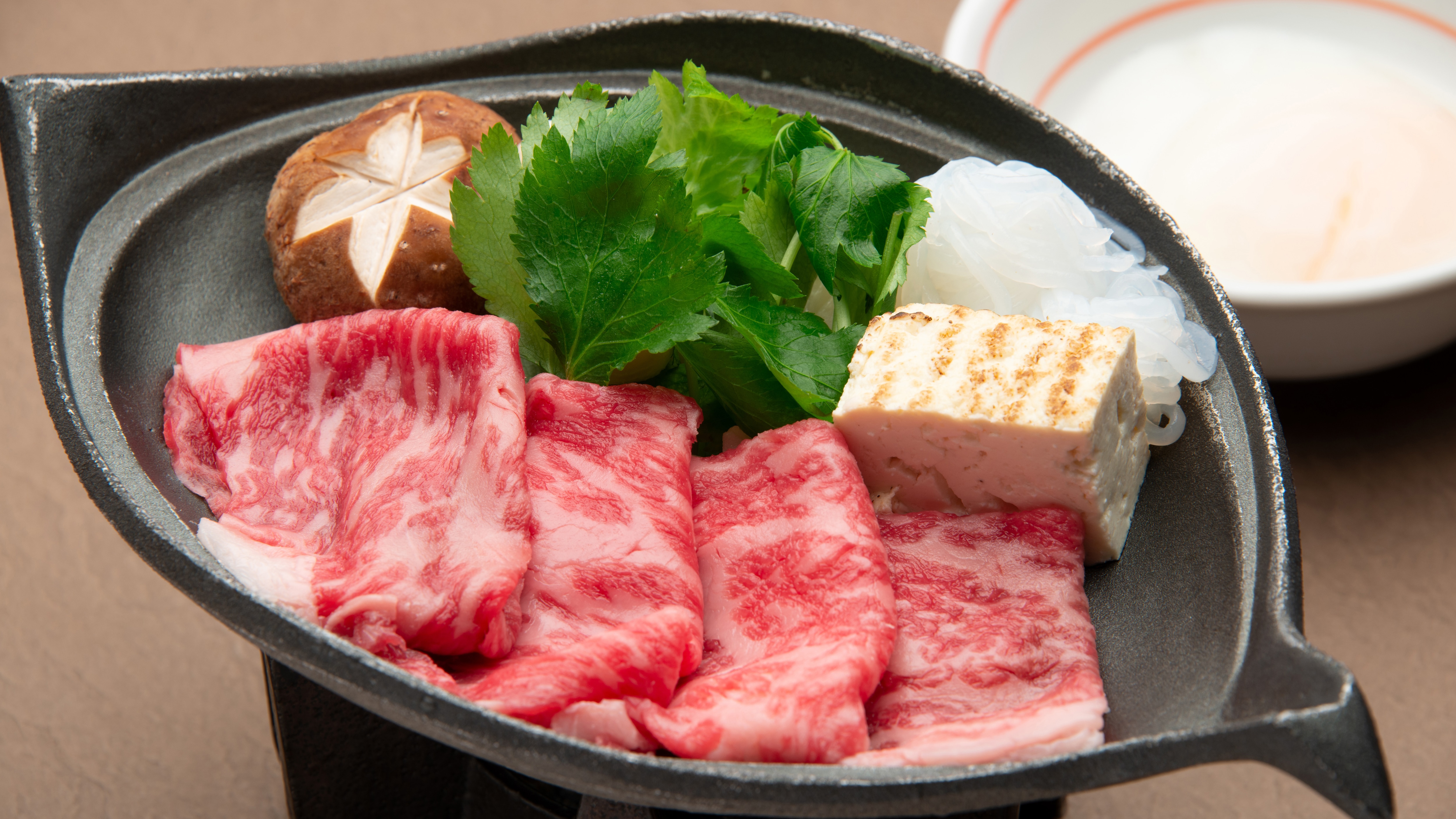 Main choice for September-October 2023: Shizuoka Suruga beef sukiyaki, onion, shirataki noodles, mitsuba, shiitake mushroom, soft-boiled egg