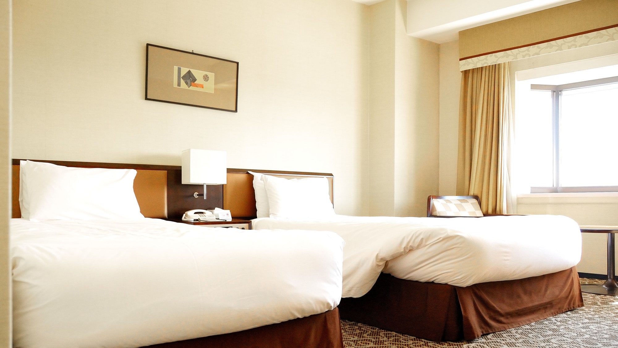 Superior Twin Room (9th to 12th floors) Size: 26 square meters Bed width: 200cm x 110cm