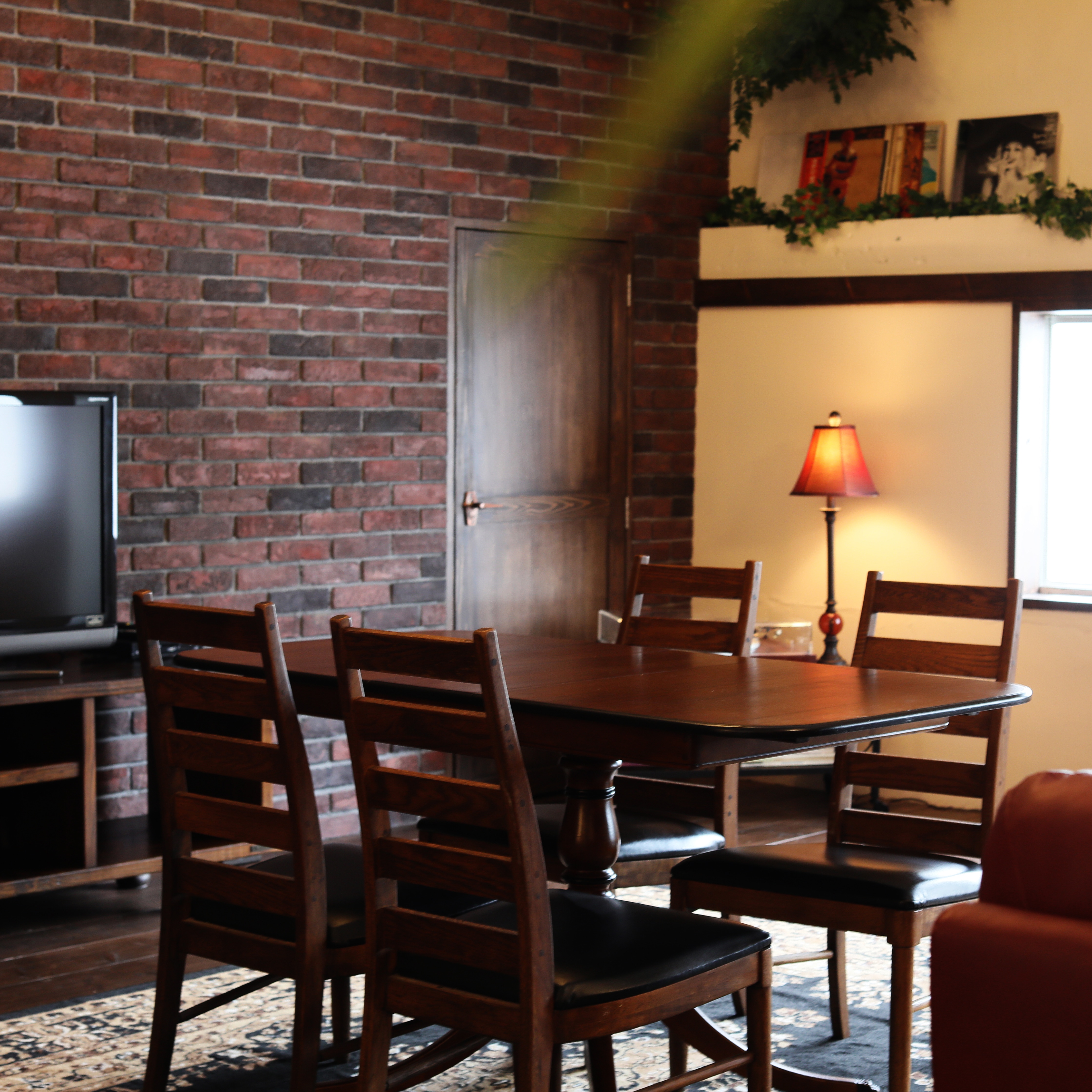 "Red Room" Dining area with vintage furniture