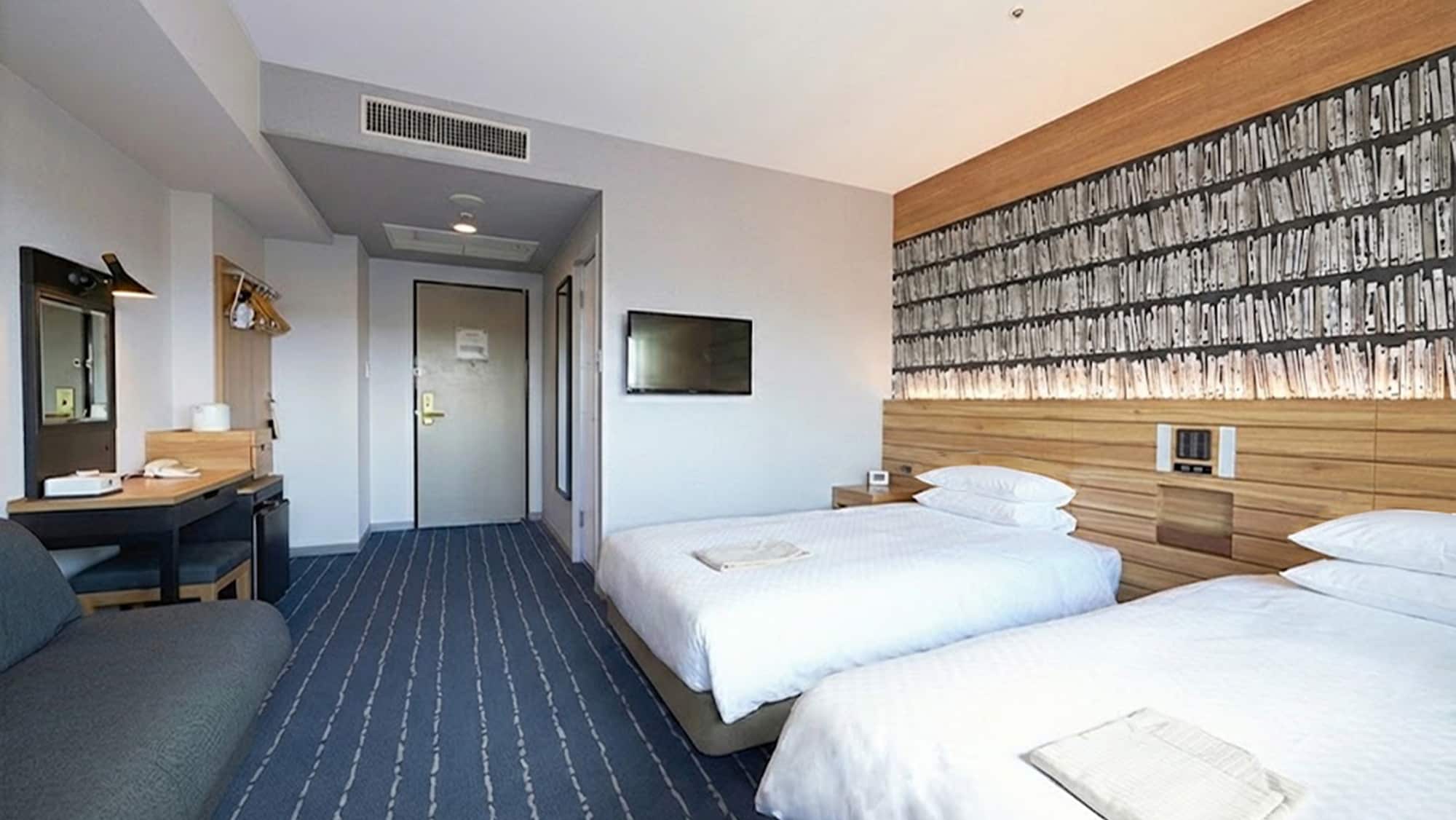 ■双床间：21.2平方米，配备两张120厘米×195厘米的床（席梦思）。