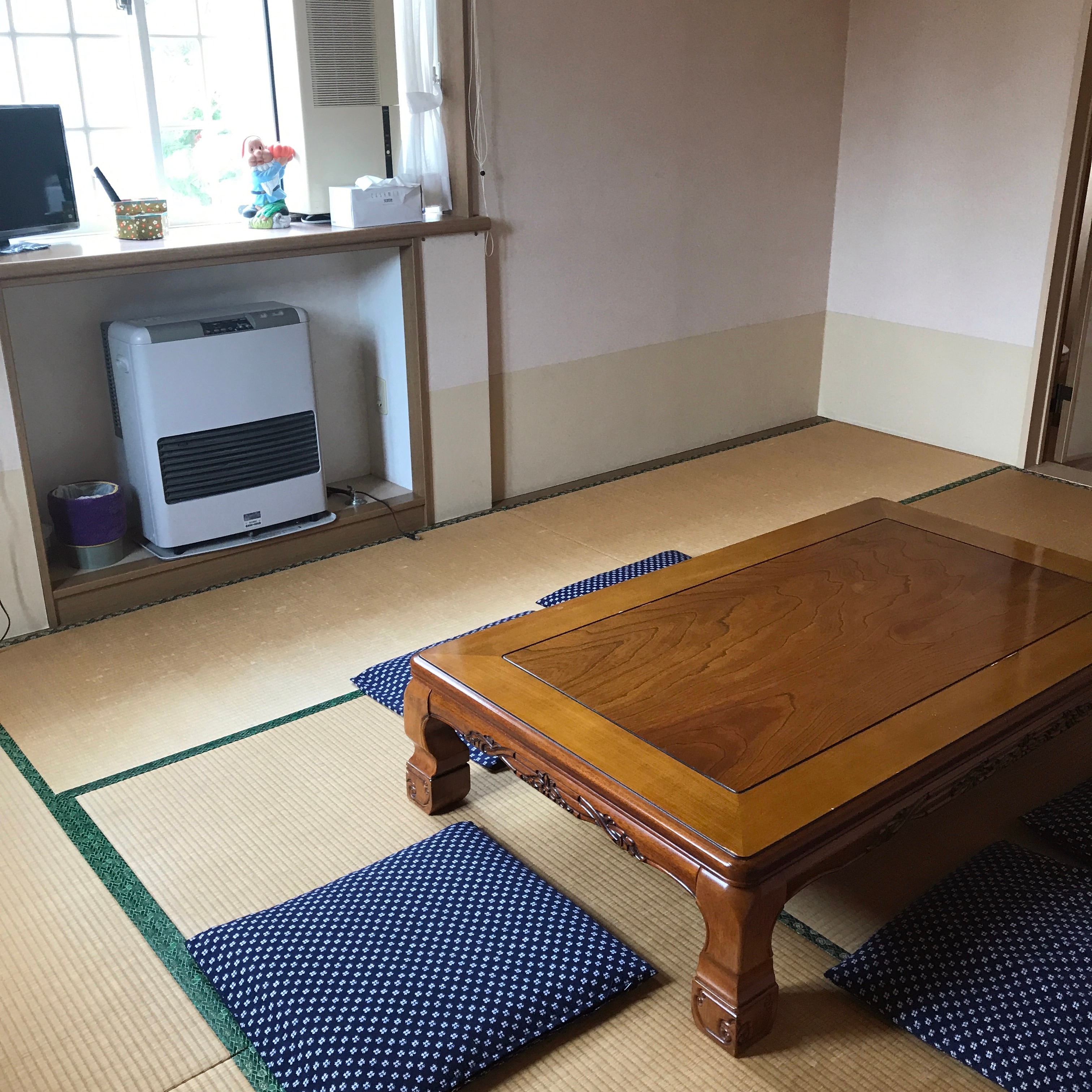 Japanese-style room with toilet and washbasin