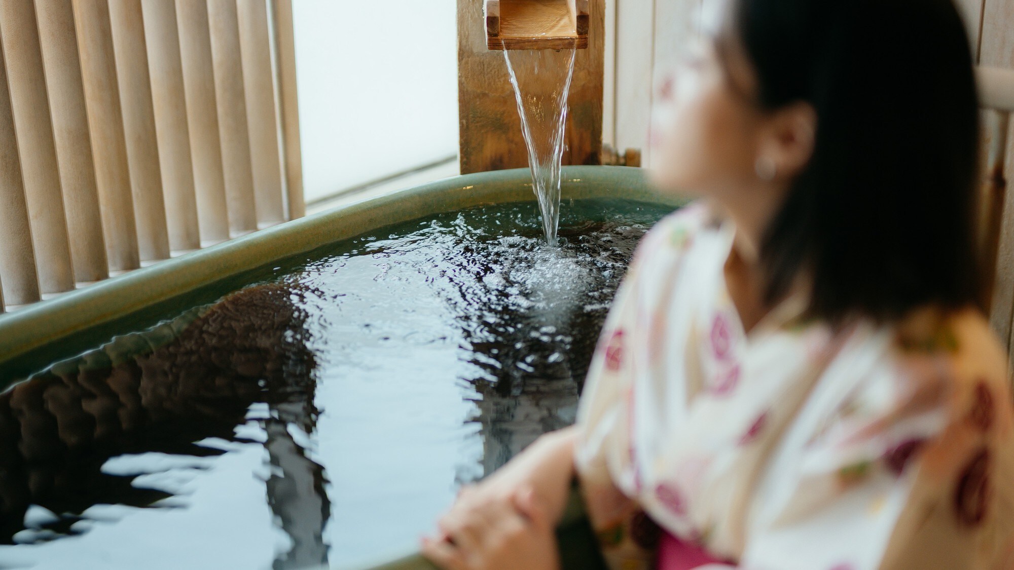 Image of a guest room with an open-air bath