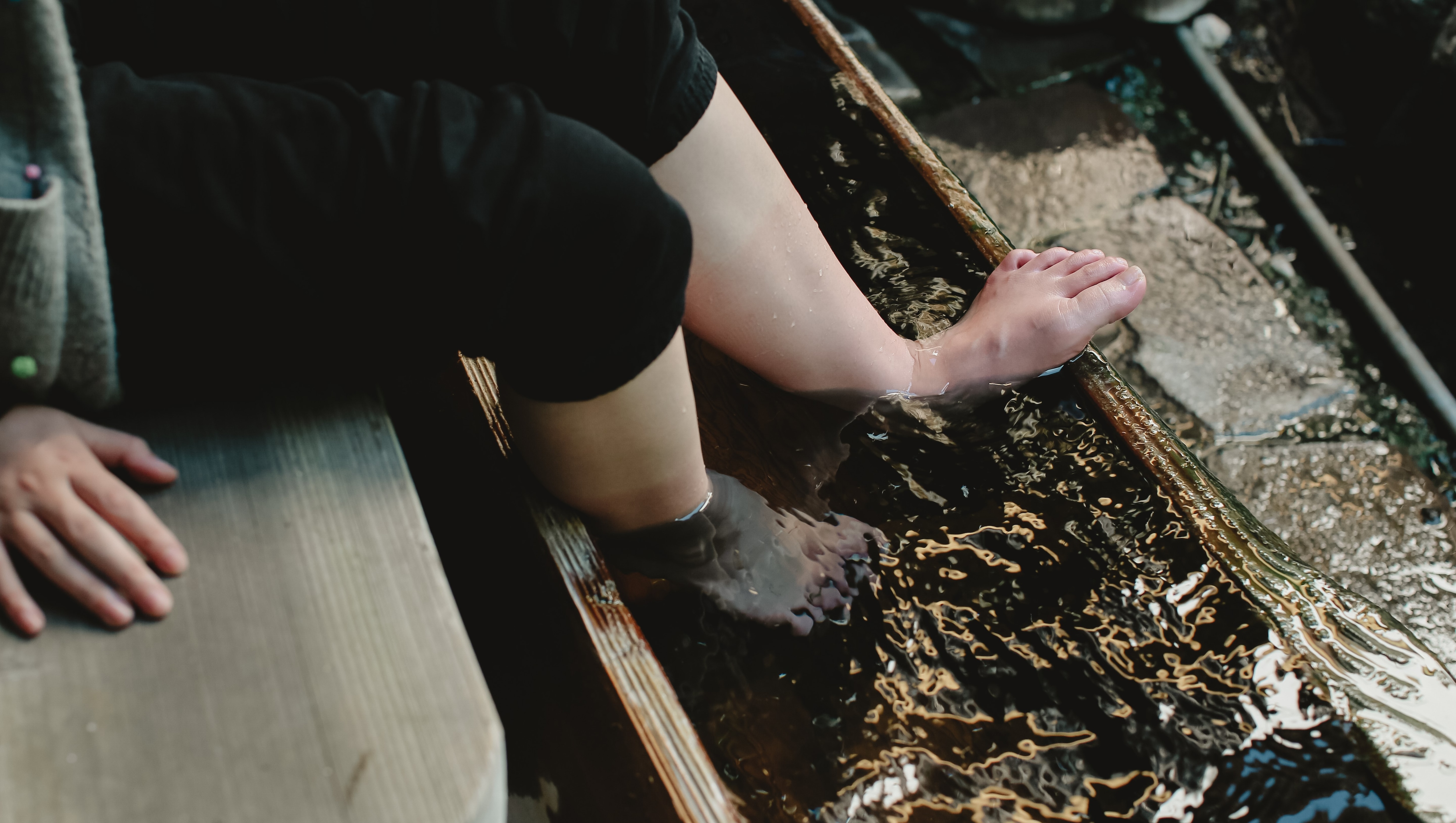 Relax in a foot bath while looking out at the courtyard