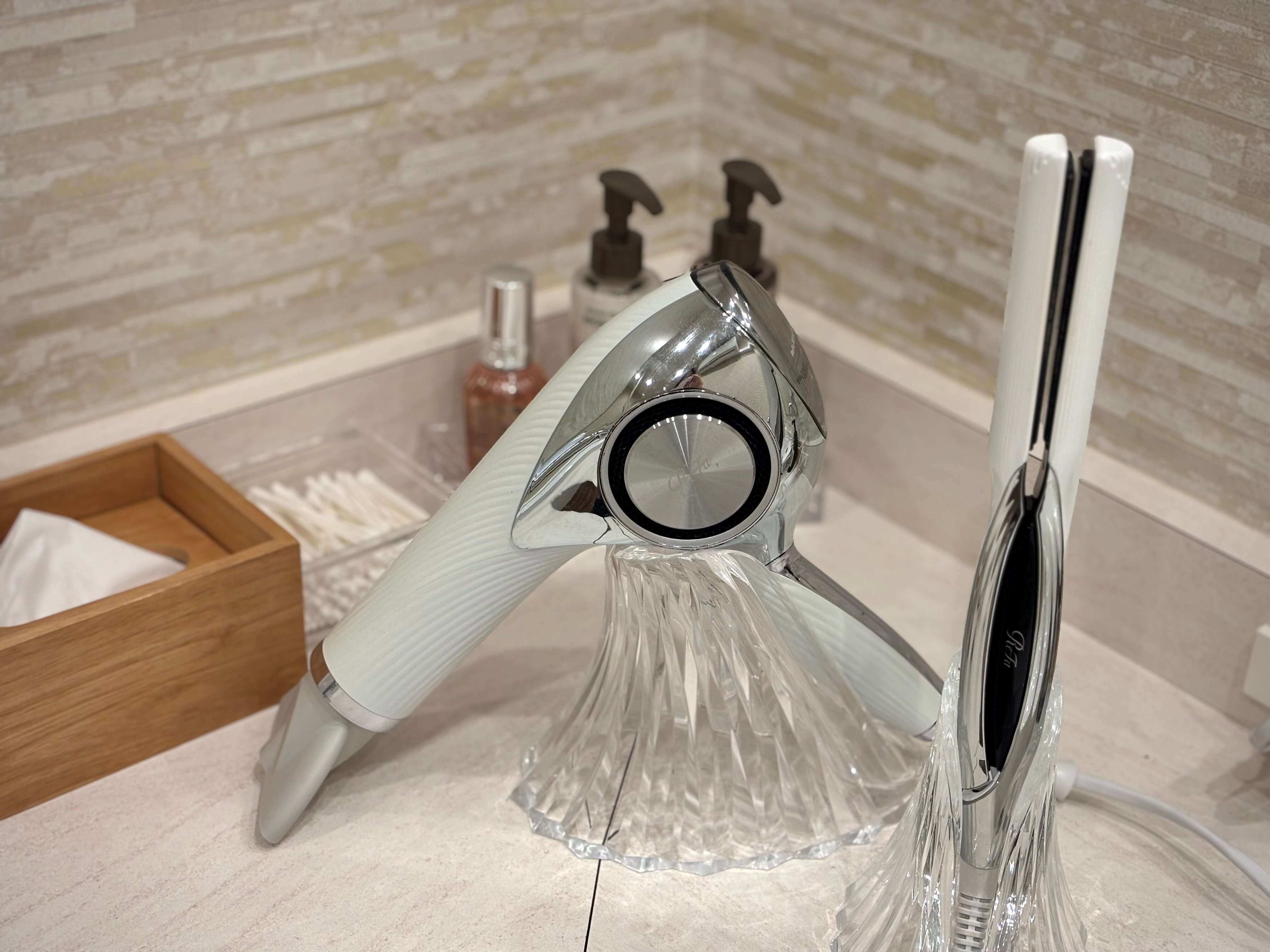 Women-only powder room with Refa hair dryer and iron.
