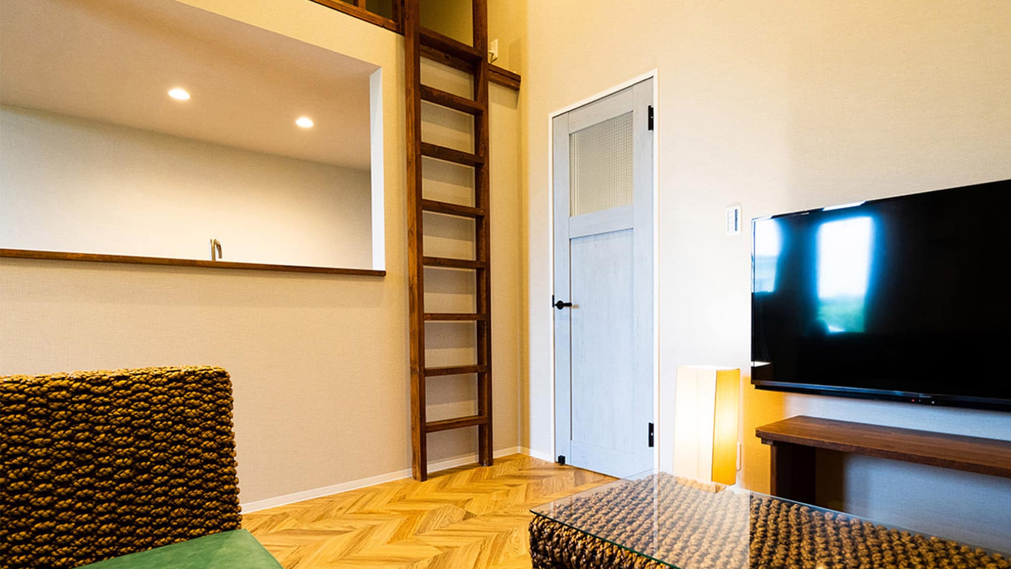 Relax in the open, high-ceilinged living room