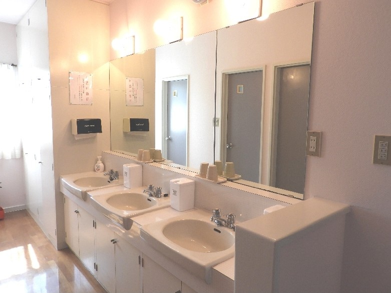 The toilet and bathroom are shared spaces.