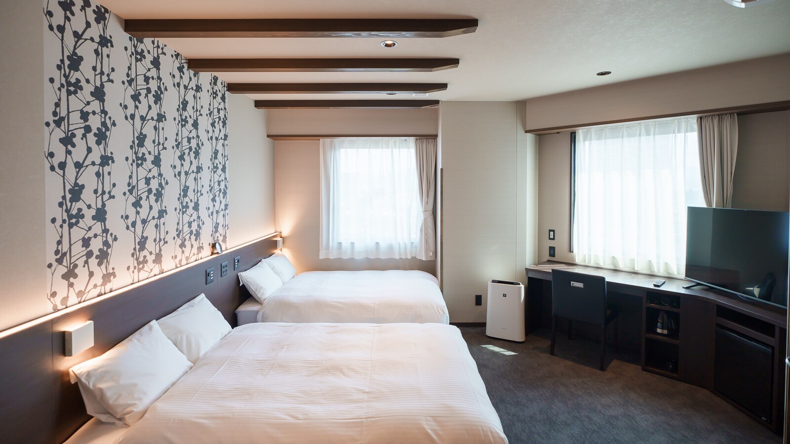 Premium twin rooms have ample space around the bed