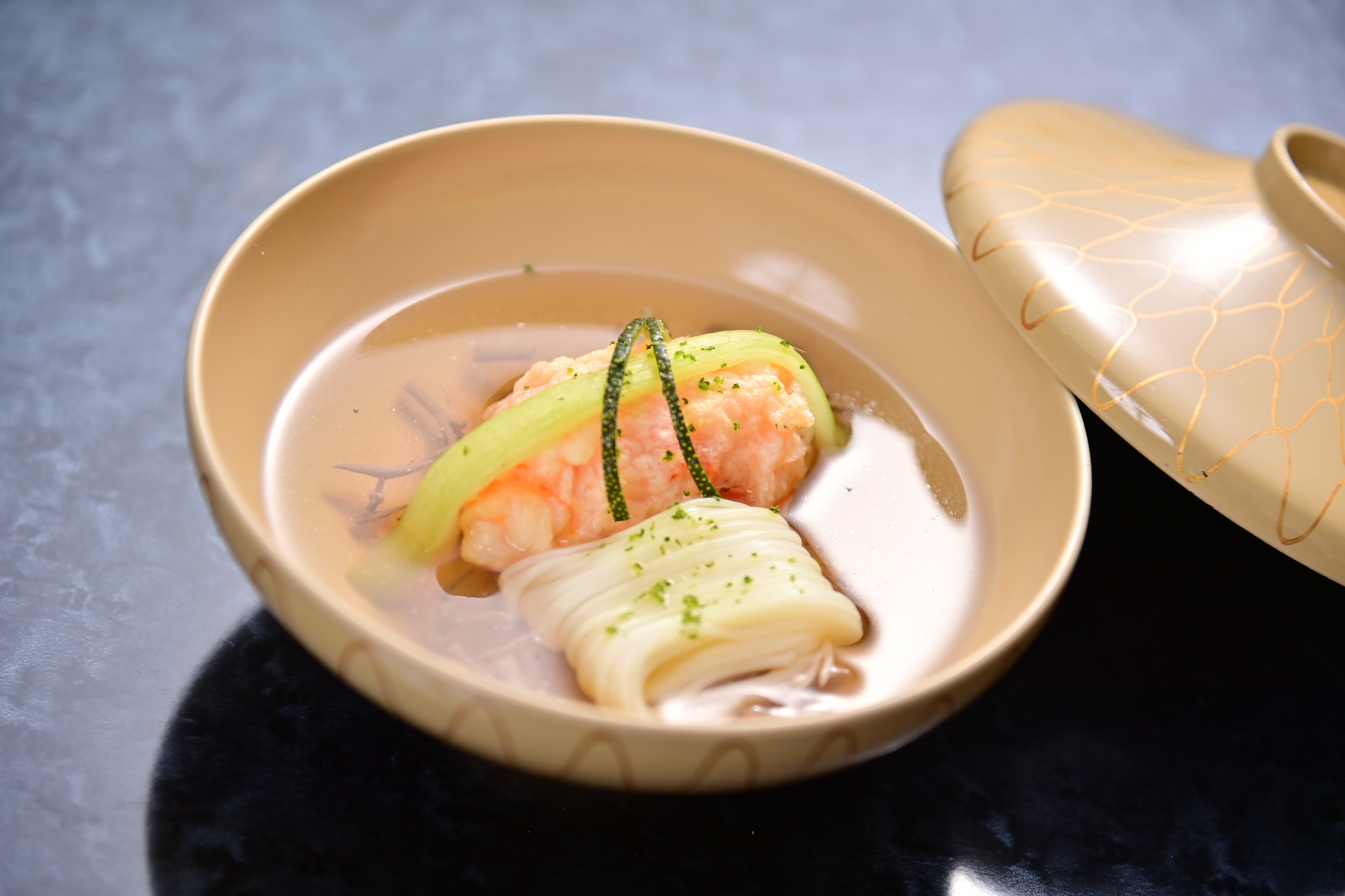 Clear soup with prawns and sweet potato