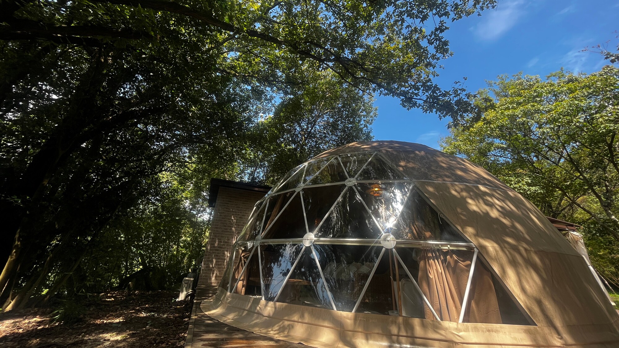 Dome-shaped tent Two exclusive dome-shaped tents built luxuriously on the vast grounds of the Hidden Forest