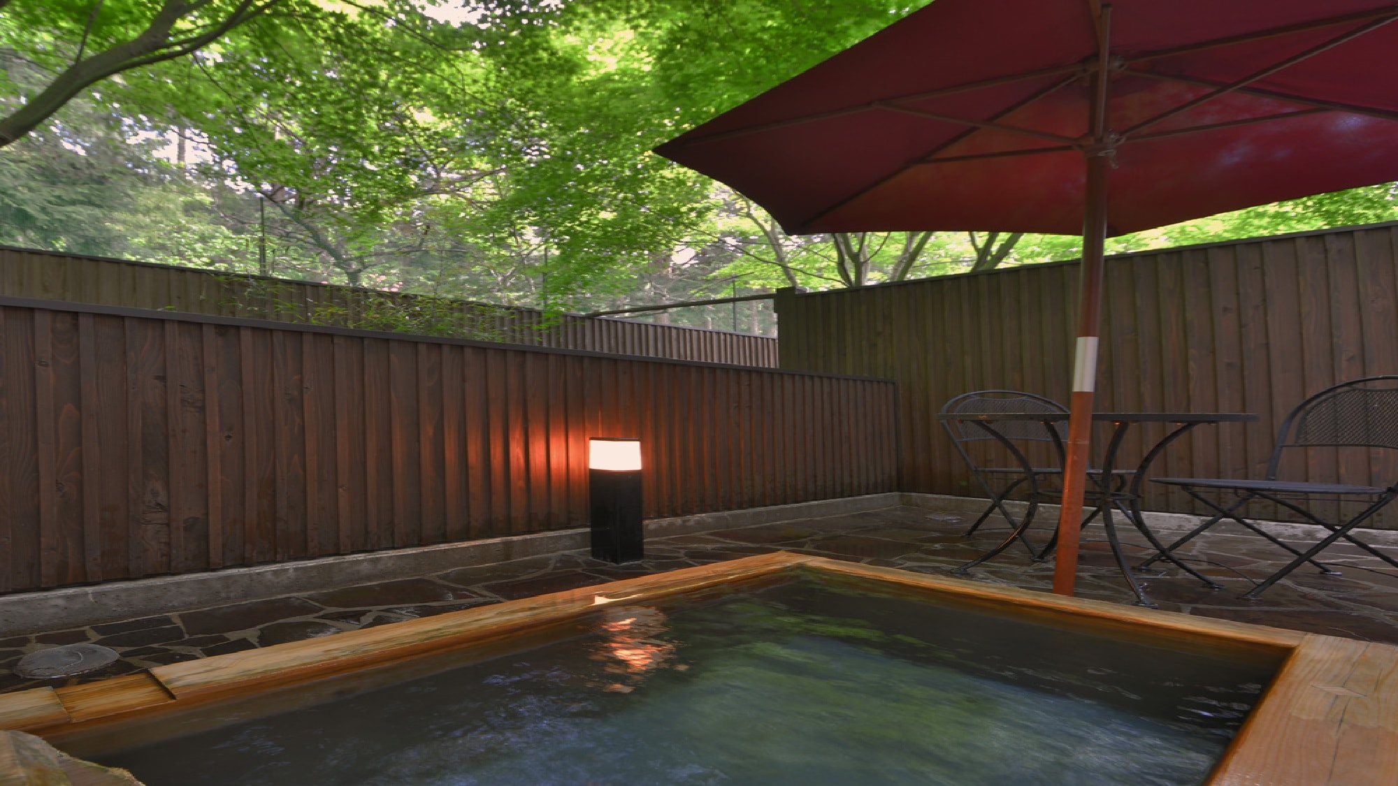 A maisonette room with an open-air garden bath - an example of an open-air bath