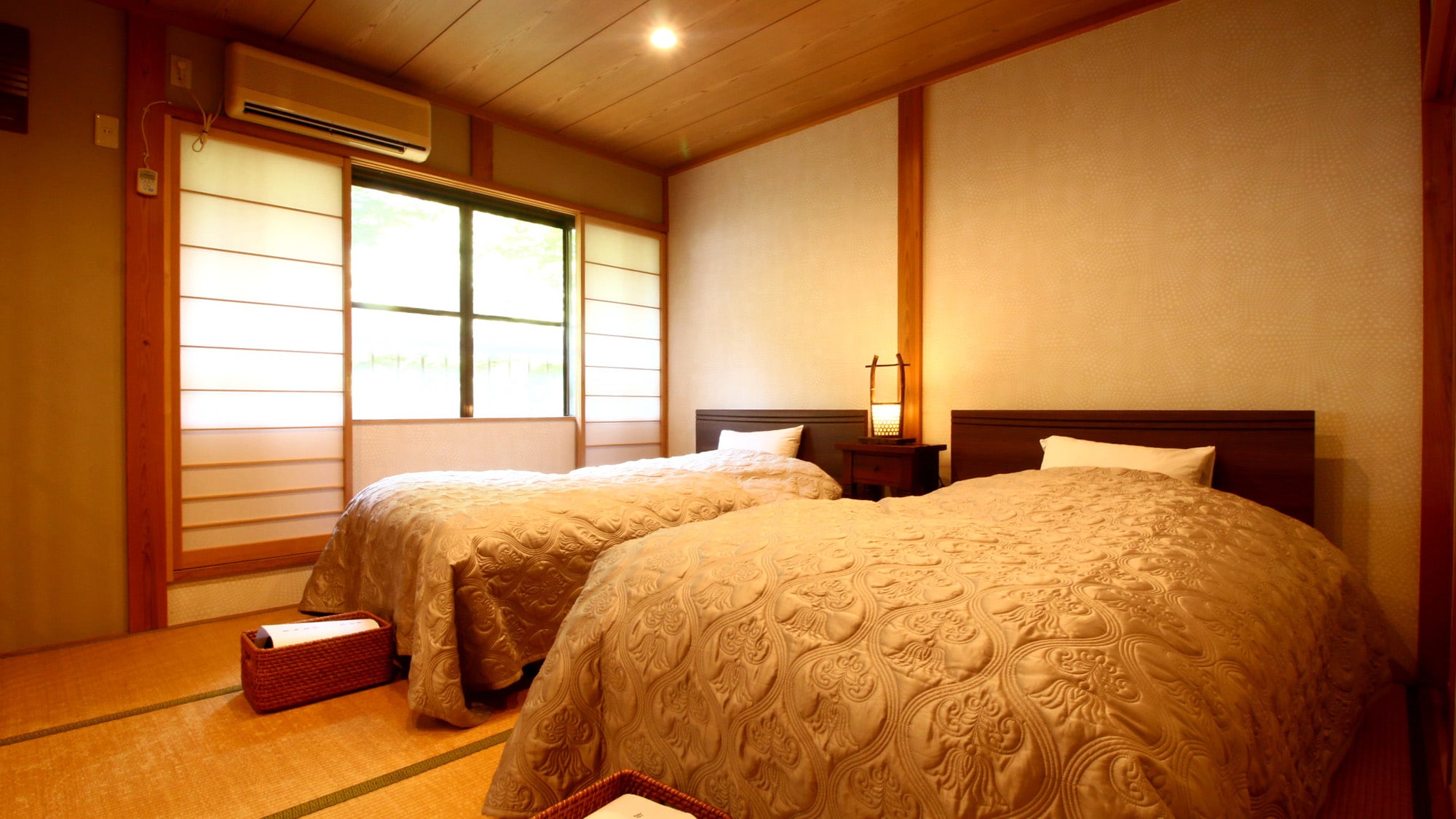 # Guest Room: Garden-facing, 2nd floor, 16-tatami Japanese-Western room with 2 semi-double beds.