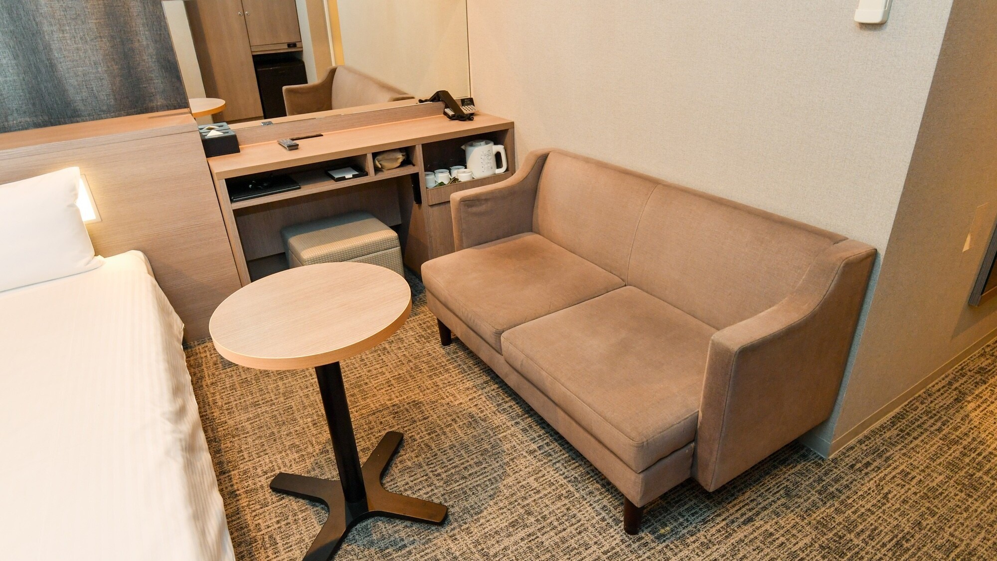 Kamar Twin Deluxe | Hanya Kamar Twin Deluxe yang memiliki sofa.