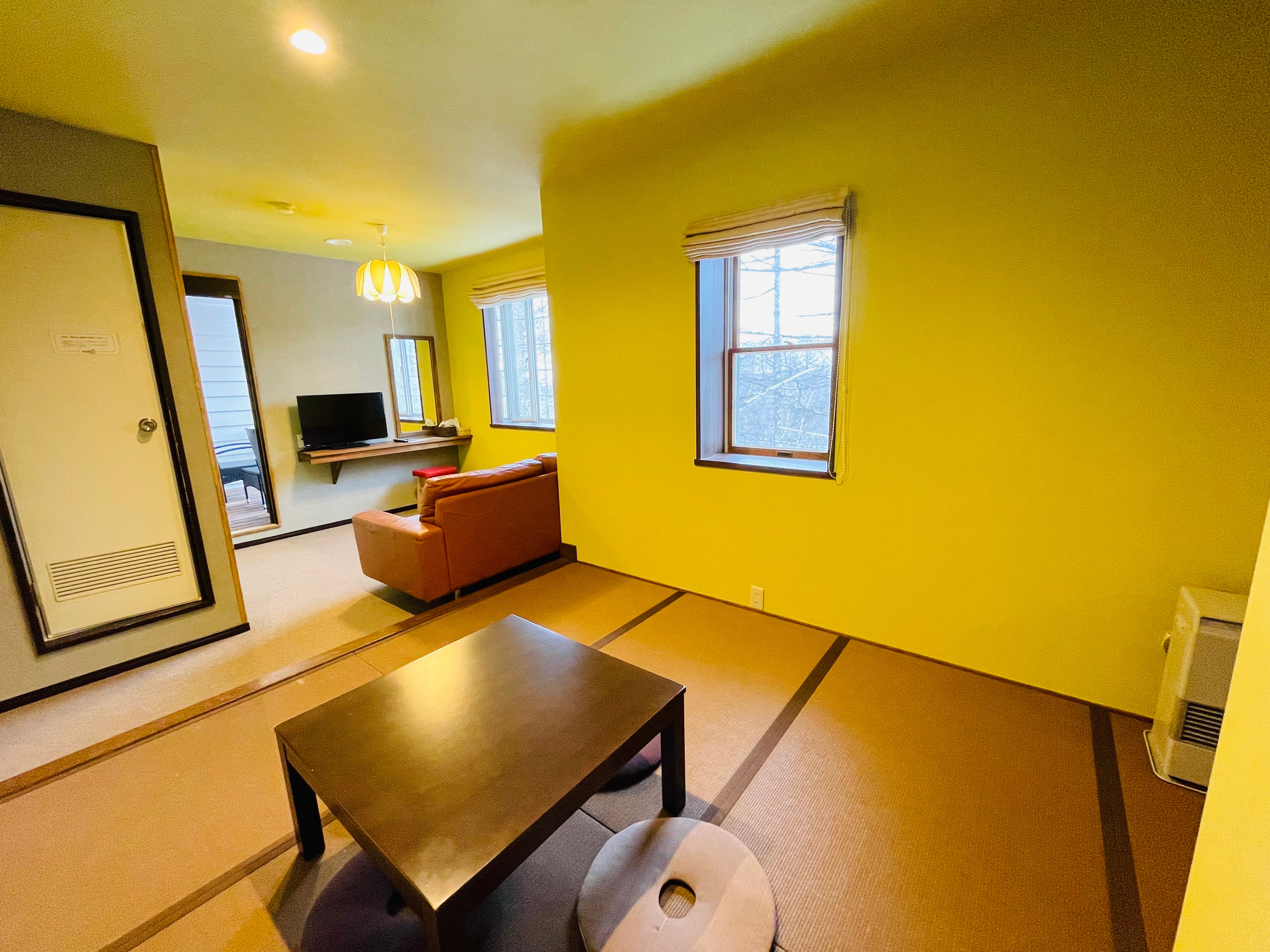 208 Japanese-Western room with raised bed. (Bathroom and toilet included) Private terrace.