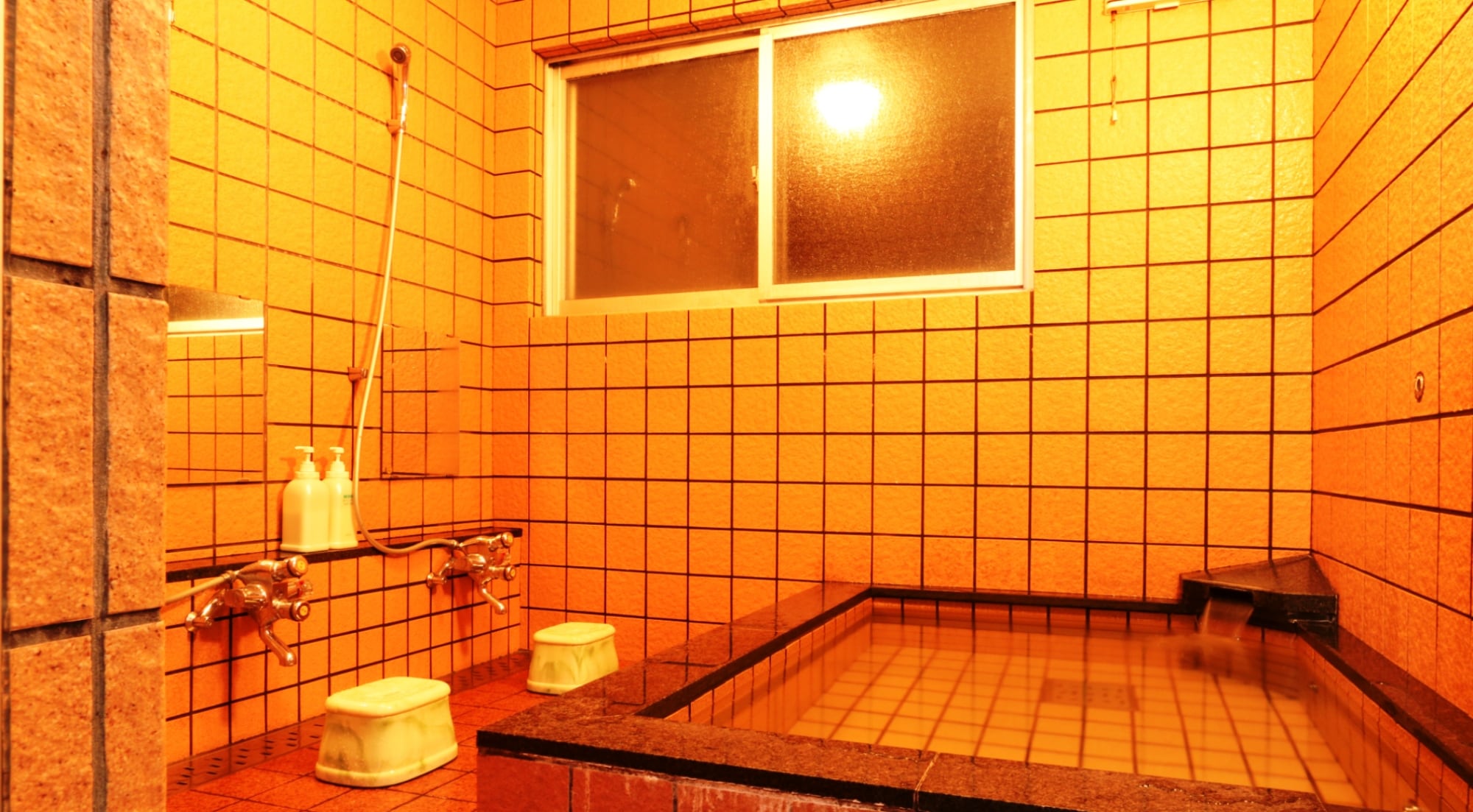 Relax and unwind after your trip in the spacious bathtub.