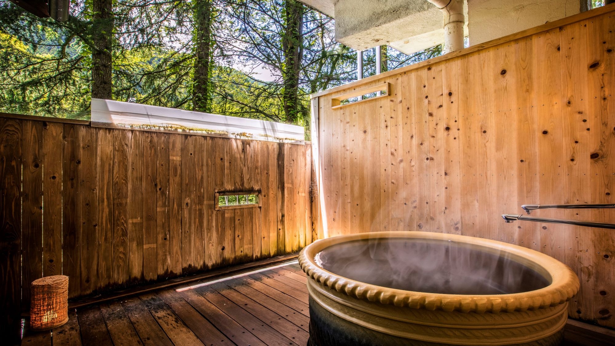 Standard Japanese-style room with open-air bath *An example of an open-air bath in a guest room