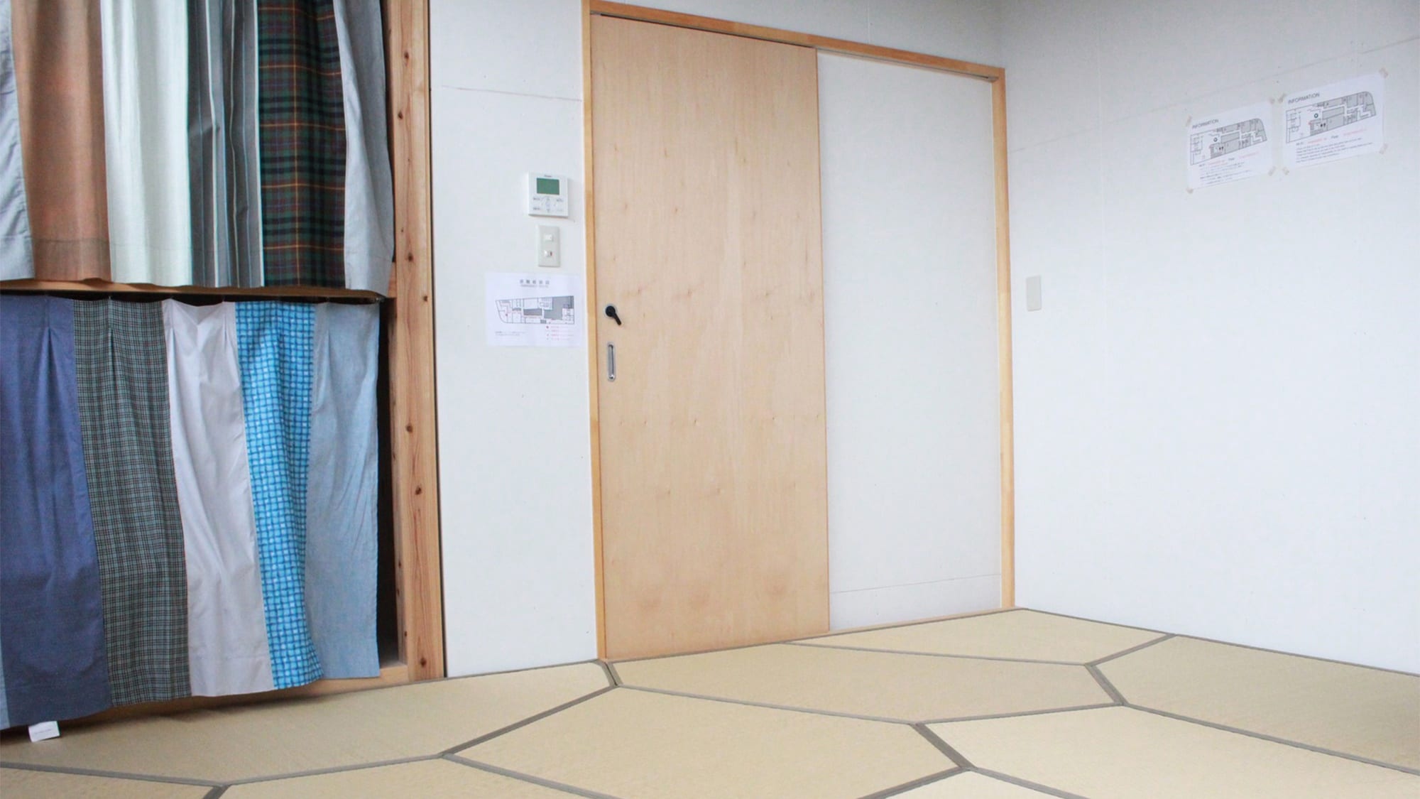・ Japanese-style room with geometrically patterned tatami mats