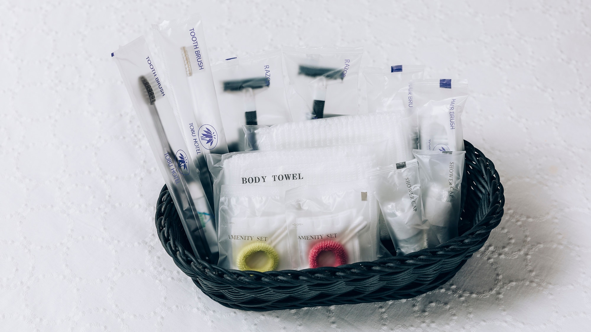 Amenity goods such as toothbrushes and body towels are available in each room.