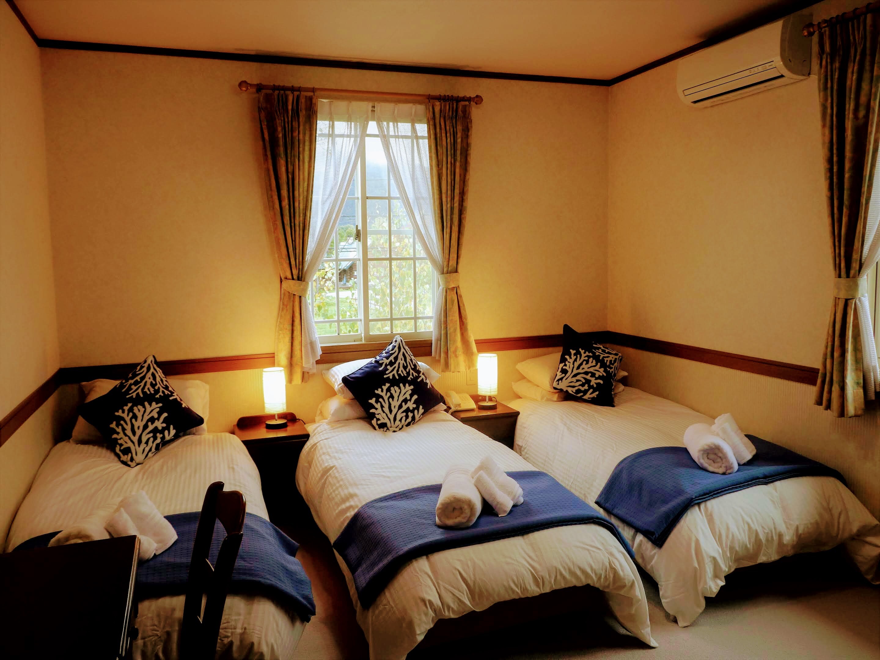 Twin or triple room with private bathroom
