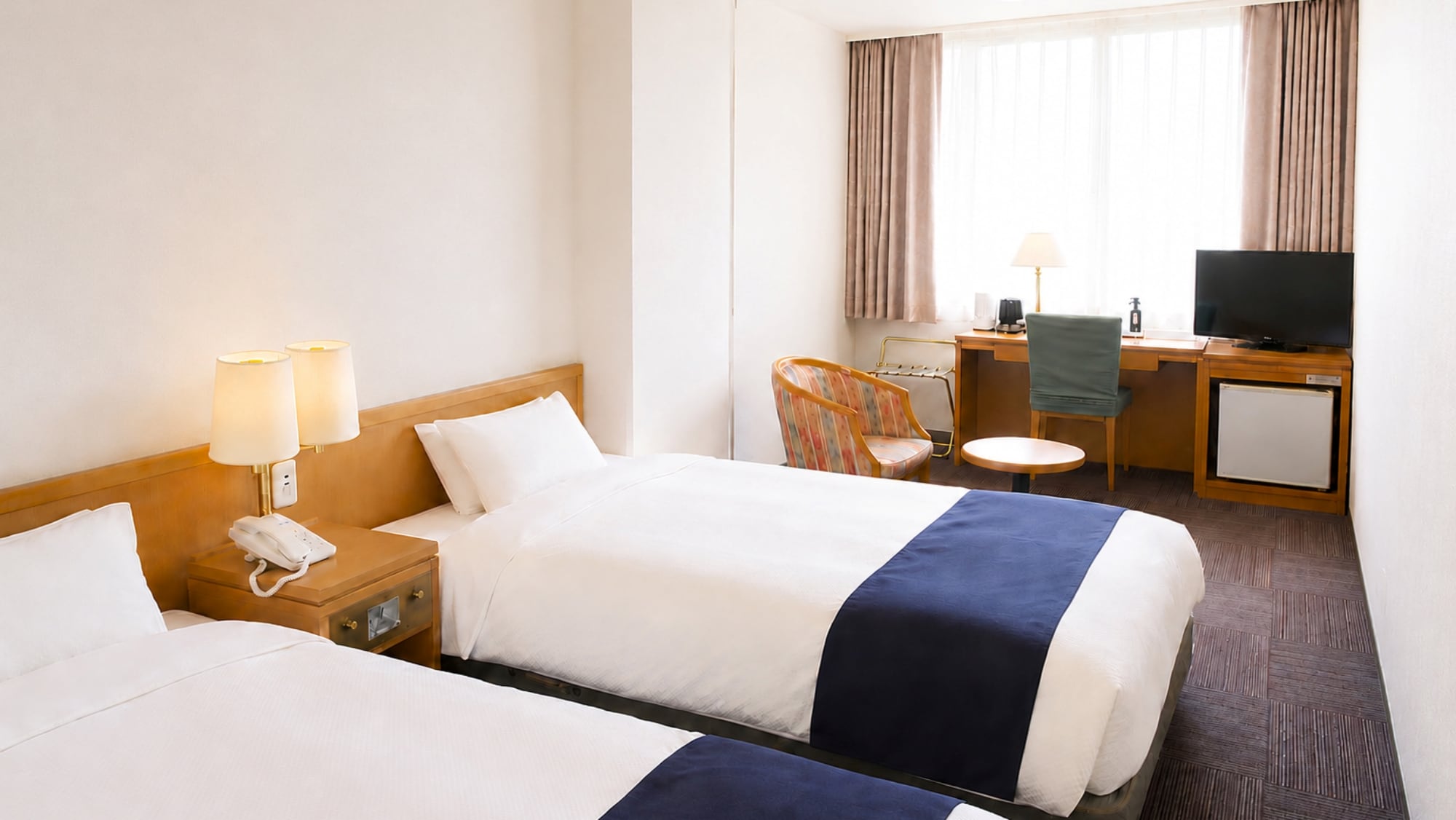 Standard Twin Room: 120cm wide semi-double beds (2 beds for twin occupancy, 3 beds for triple occupancy)