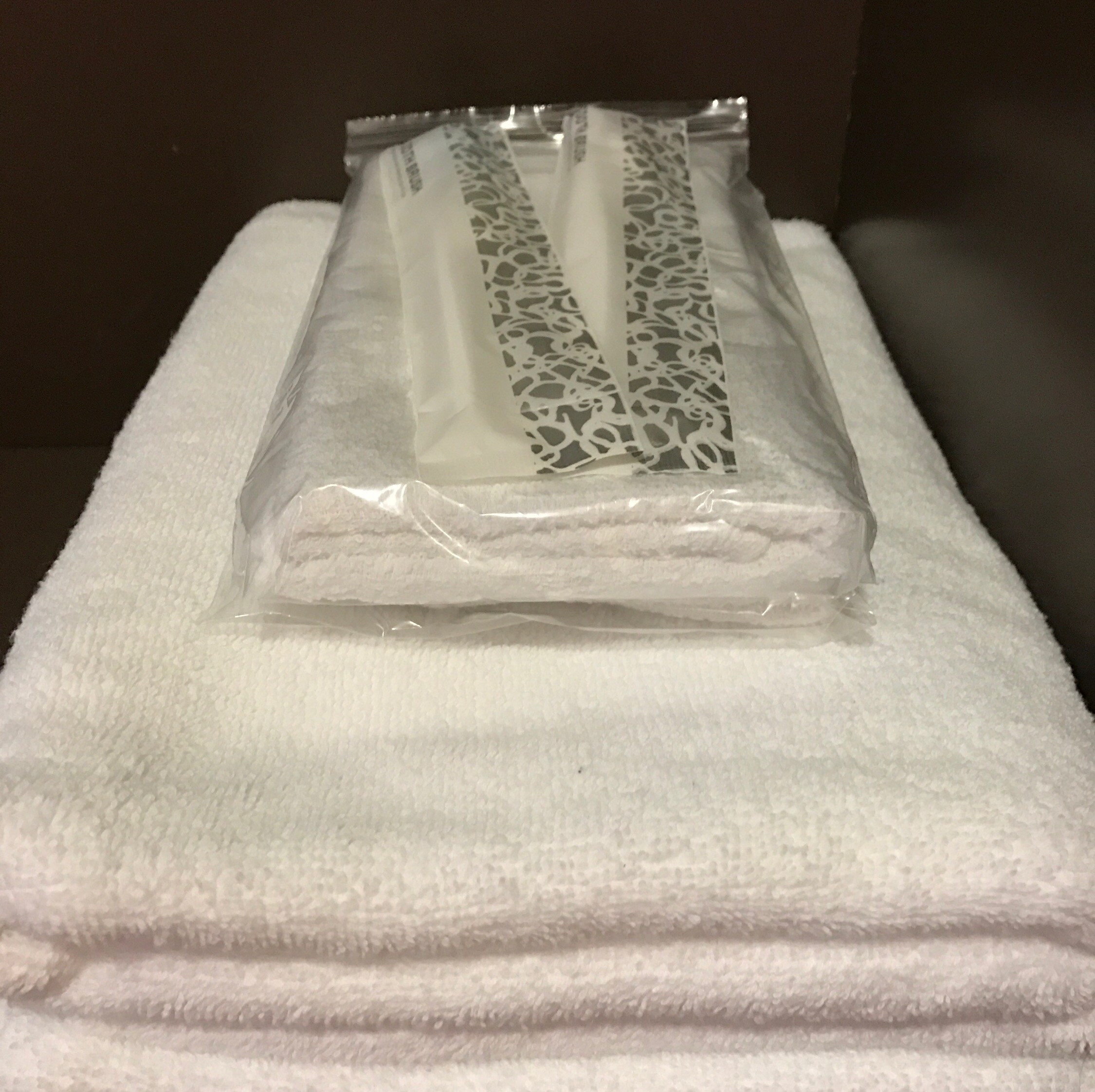 Amenities include bath towels, towels, and toothbrushes. Shampoo, body soap, and hair dryers are provided in the bathroom.