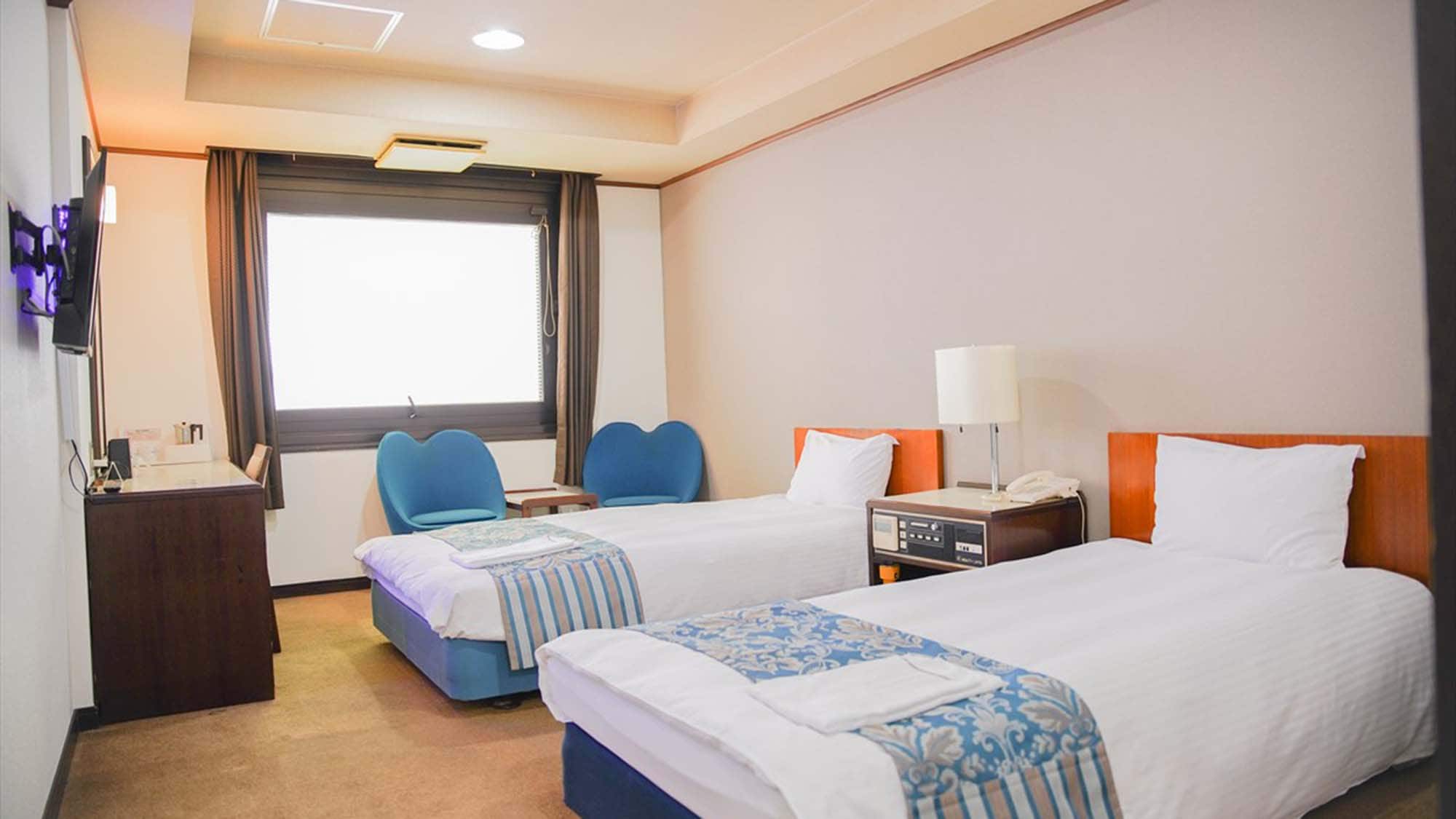 ・ Twin room (non-smoking) example: Two single beds are available in the room on the second floor.