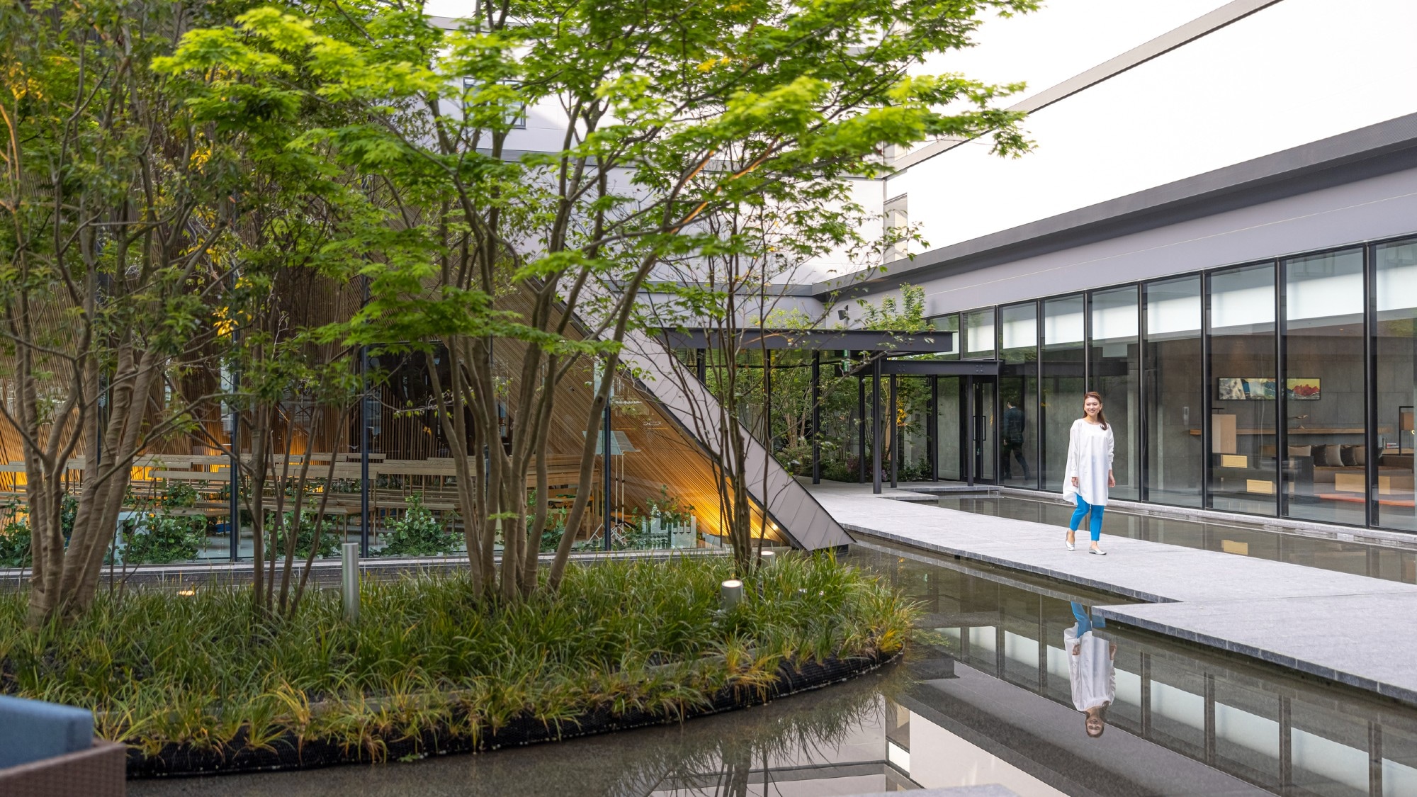 [Lagoon] A water basin surrounds the chapel in the courtyard.