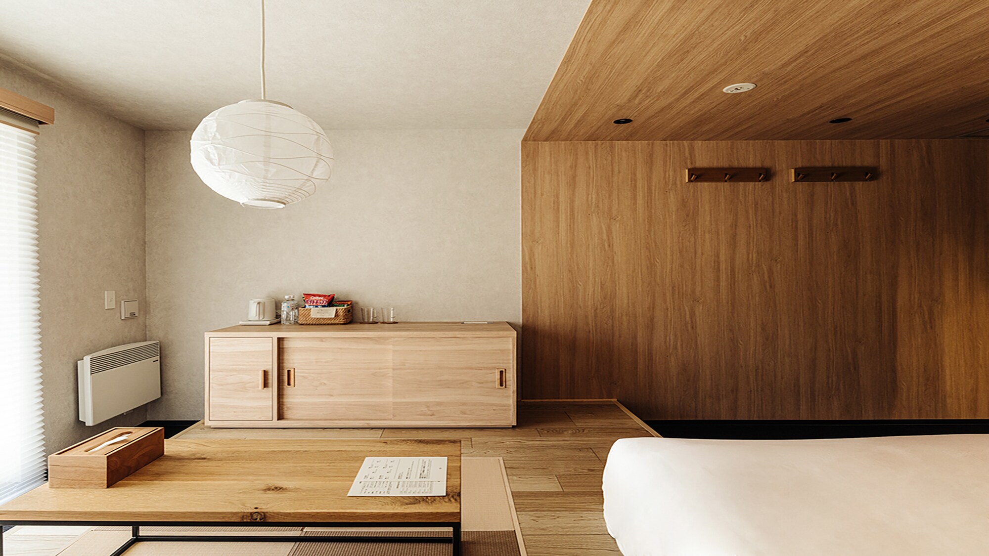 A standard double room with a comfortable, modern Japanese feel, made from natural materials.