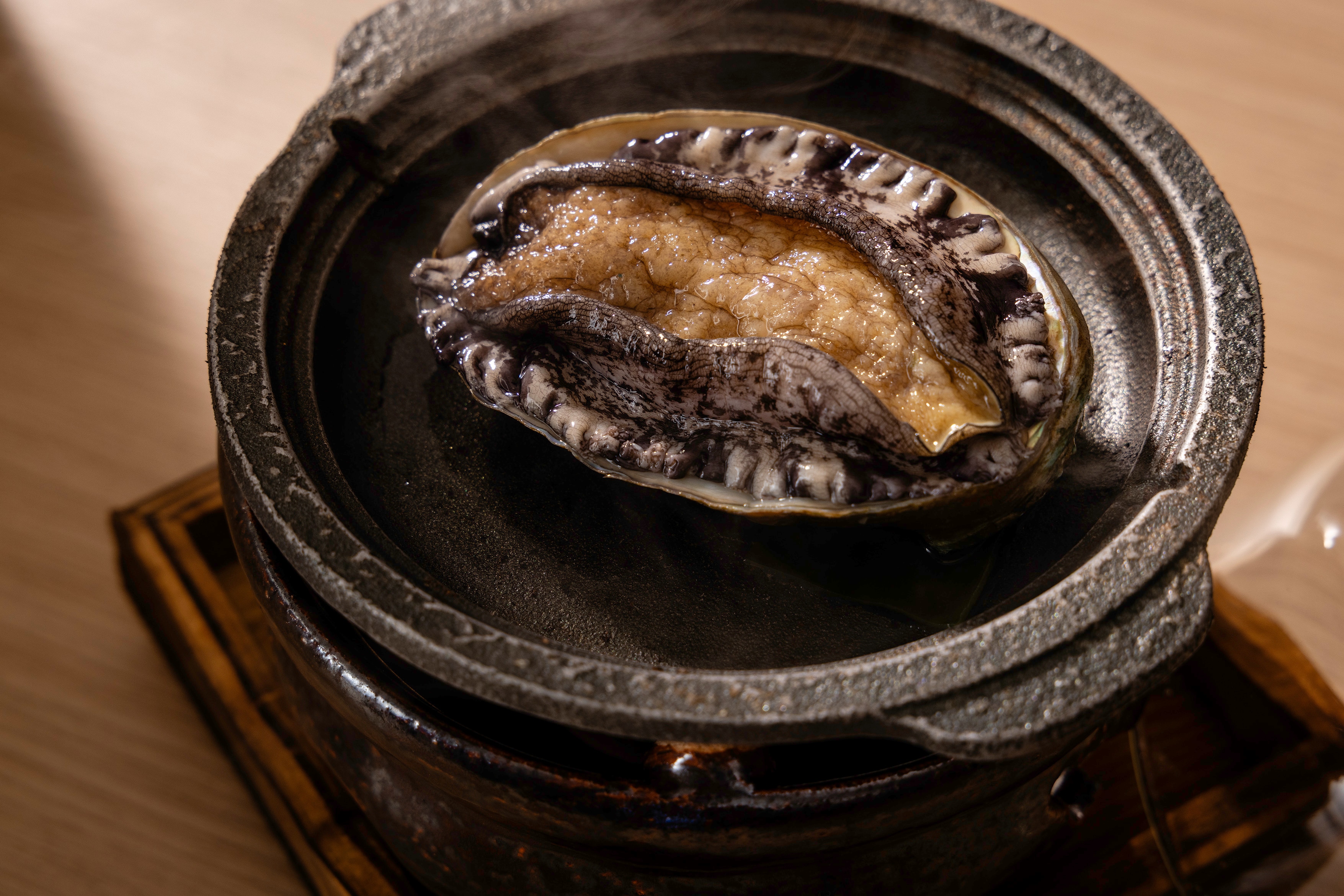 Image of steamed abalone in sake