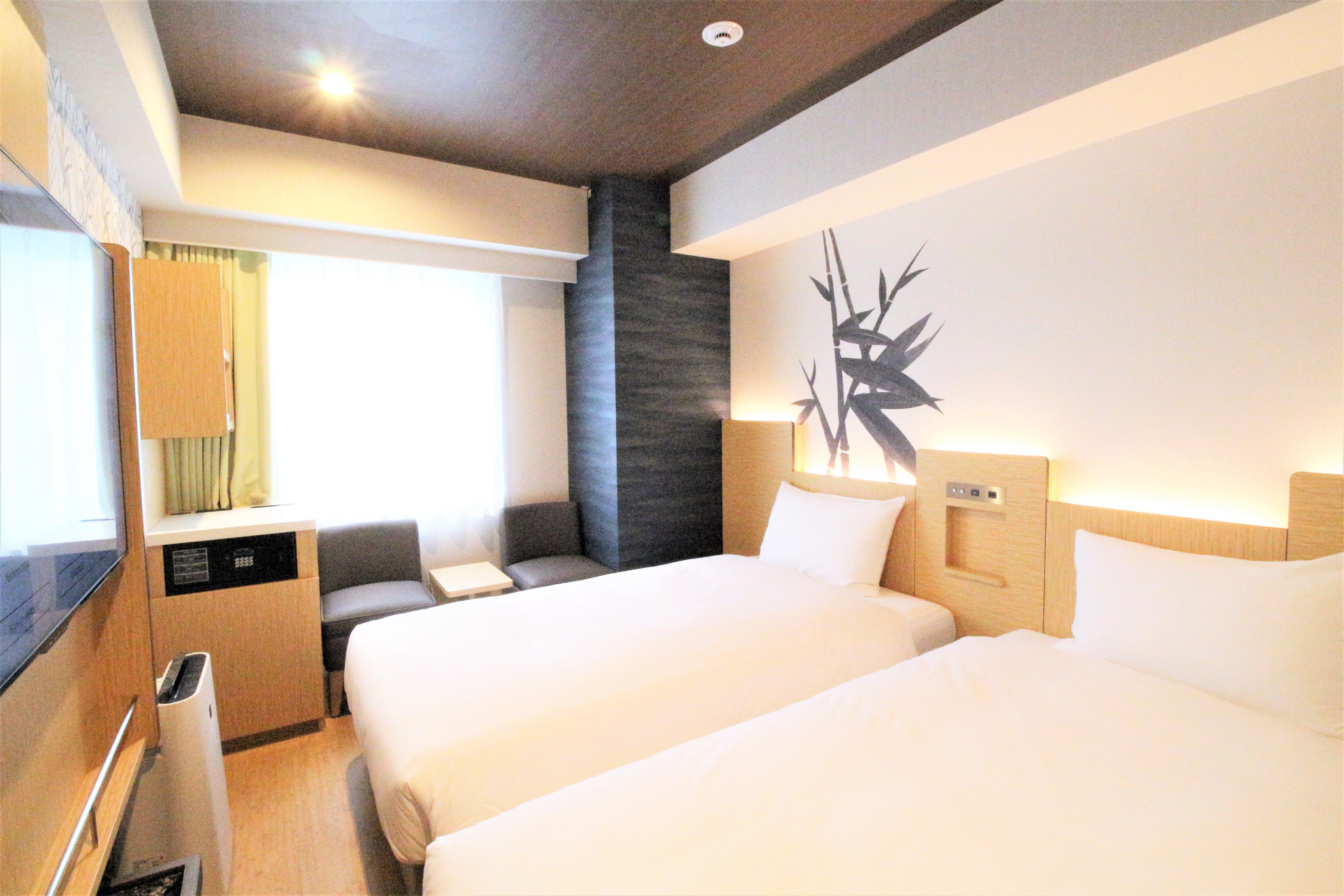 Economy twin (tanpa meja) (contoh kamar tamu) Tipe semi-terpisah dengan bak mandi dan toilet terpisah