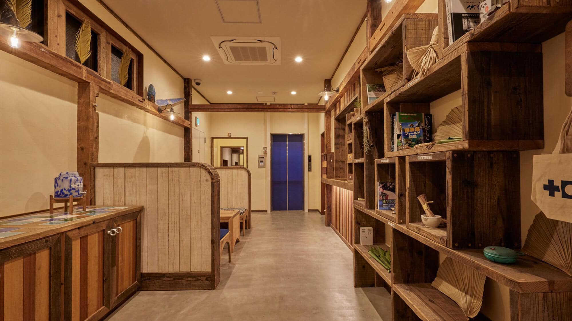 [Lobby/Front Desk] In front of the front desk on the 1st floor