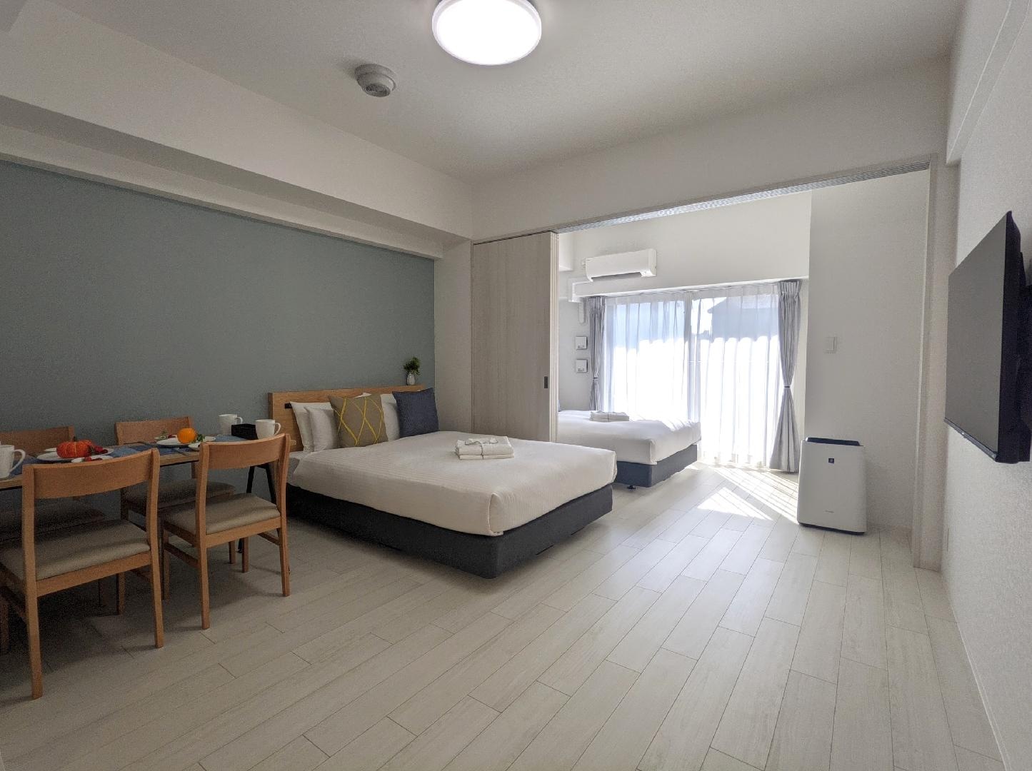 2 double beds with partition