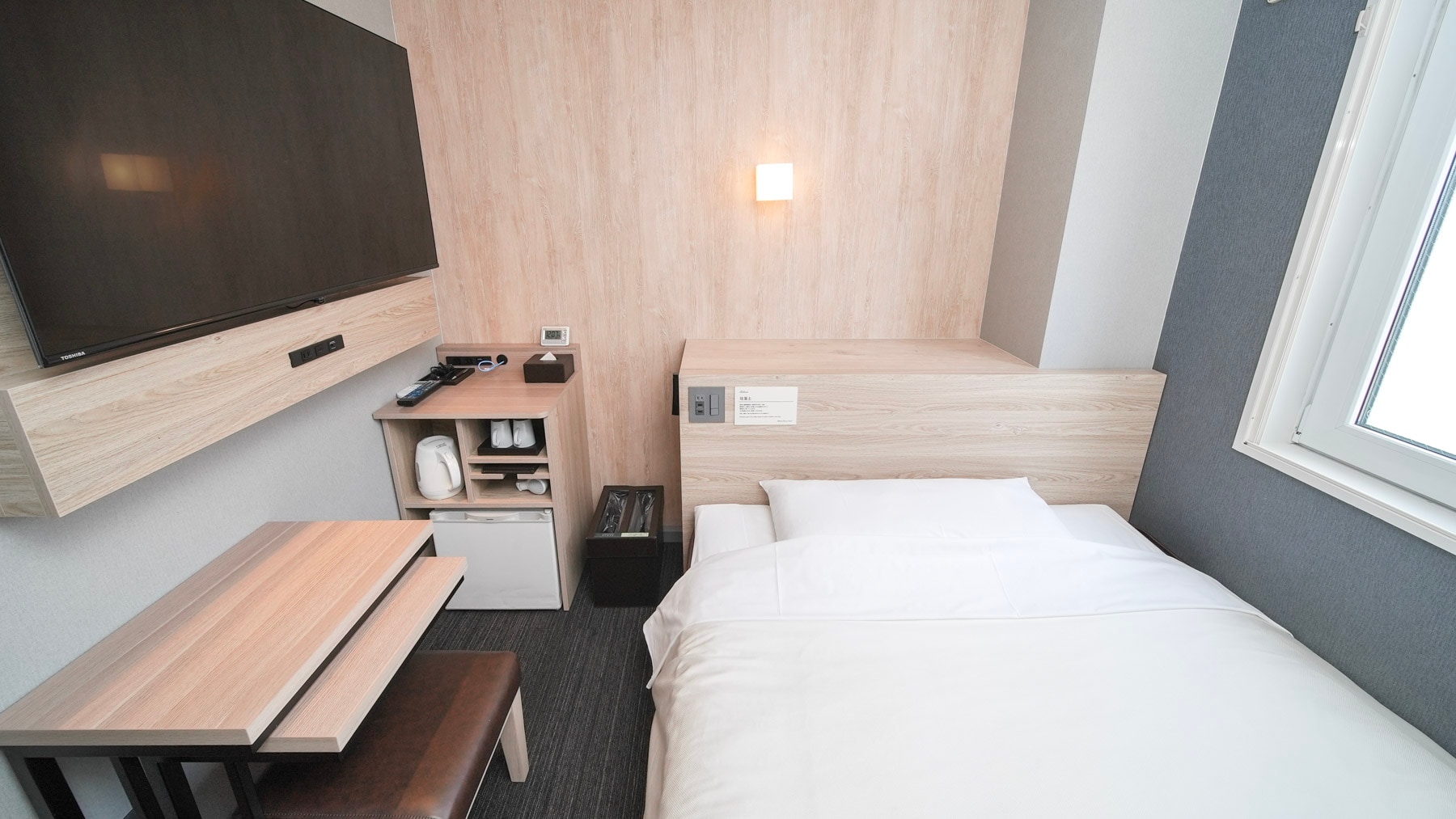 Tempat tidur selebar 150 cm dan kasur dengan tingkat kekencangan yang tepat akan memastikan Anda tidur nyenyak.