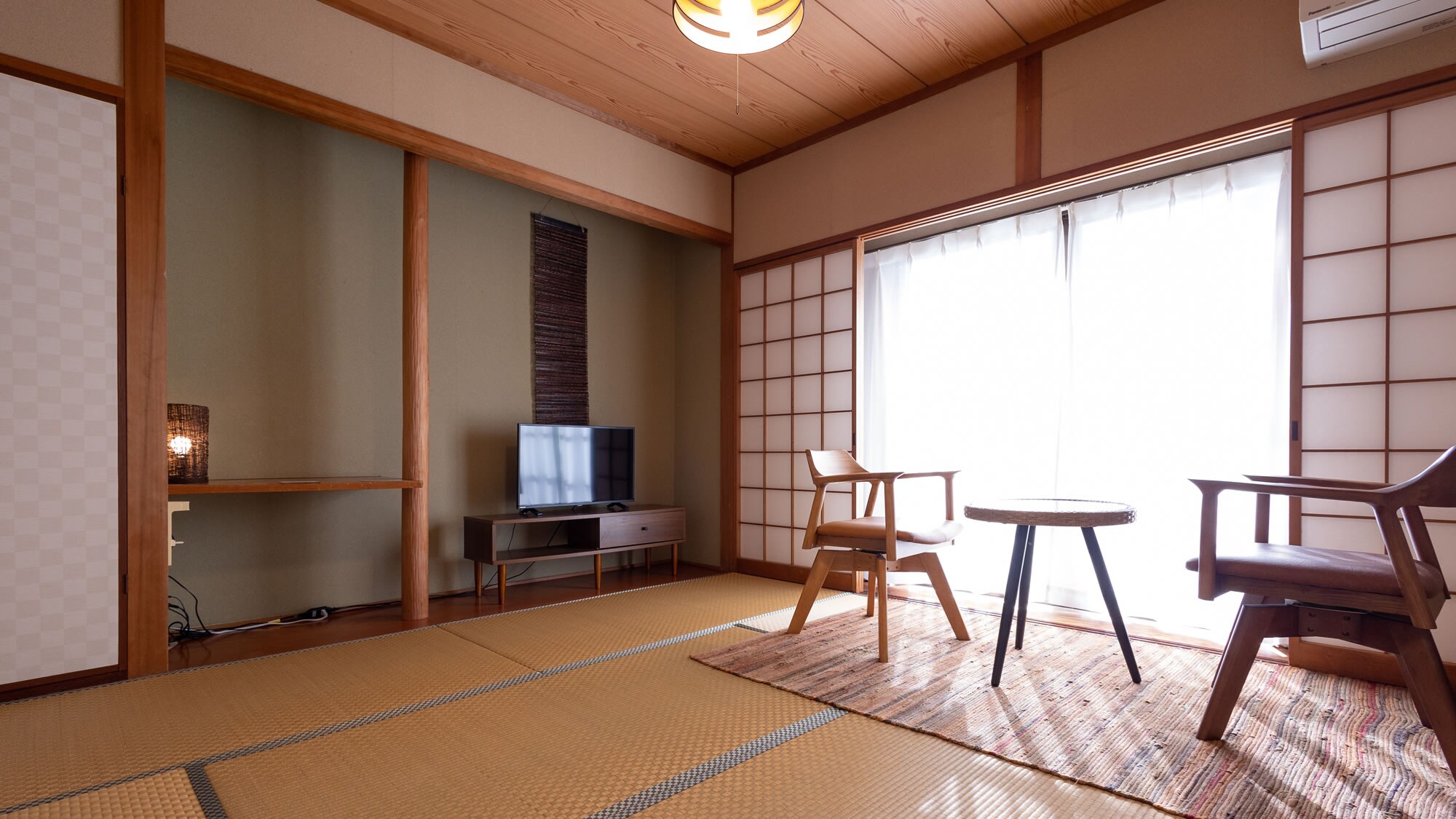 A Japanese-style room with morning sunlight streaming in