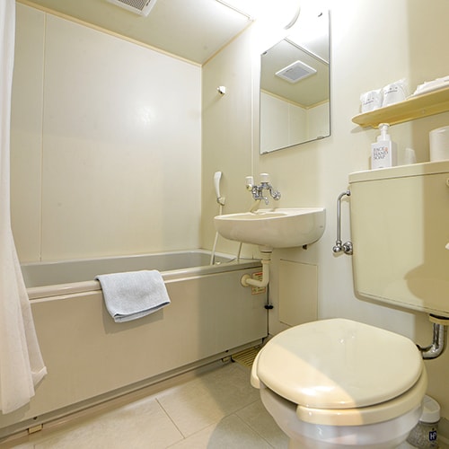 * Twin room (example of guest room) with unit bath
