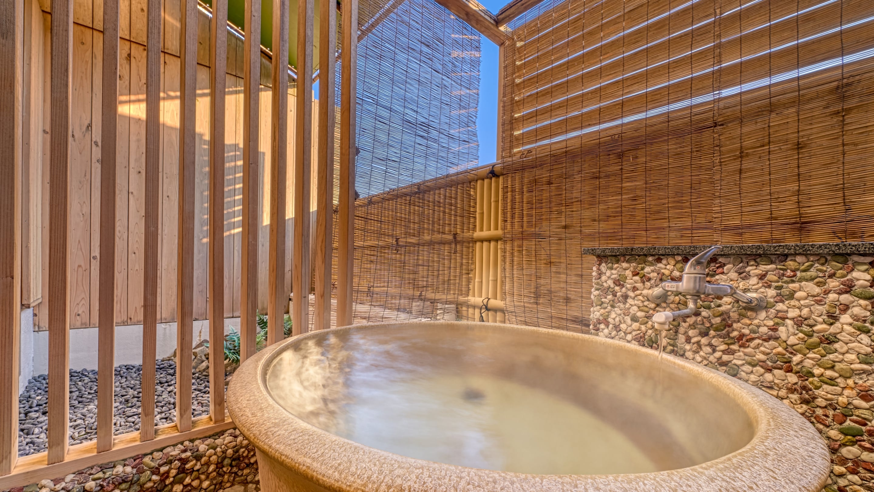 Standard Japanese-Western twin room with open-air bath *An example of an open-air bath in a guest room
