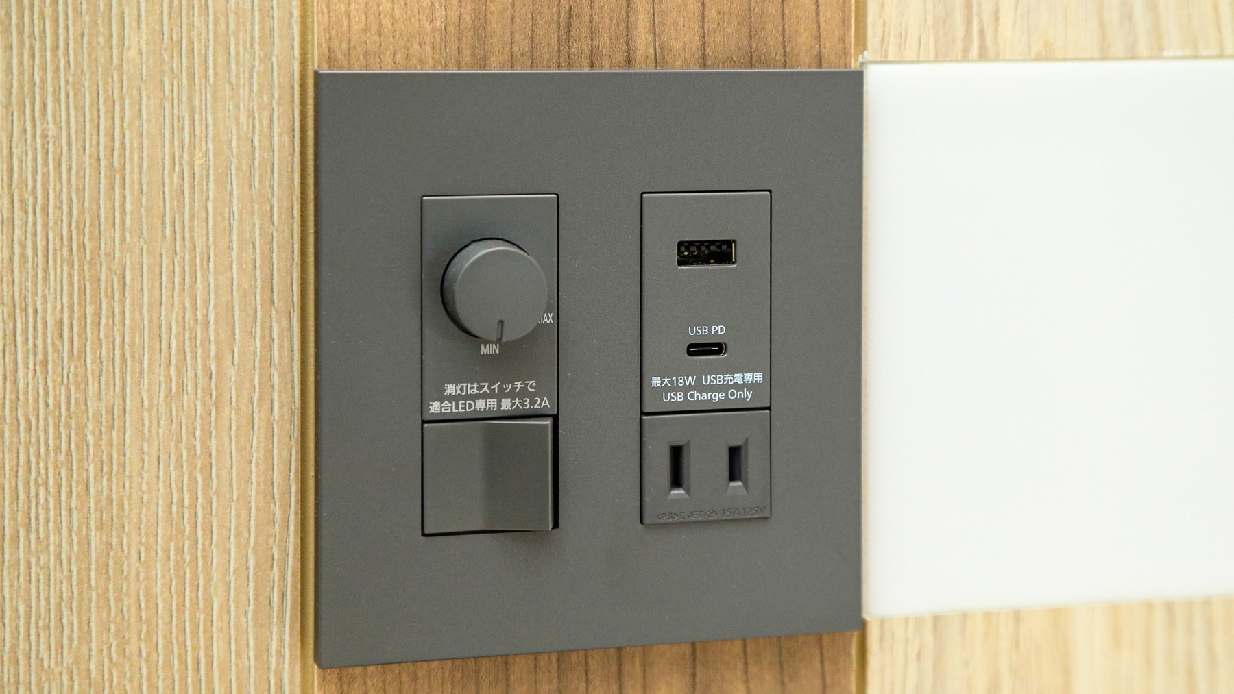 There is an outlet and USB port on the bed board.