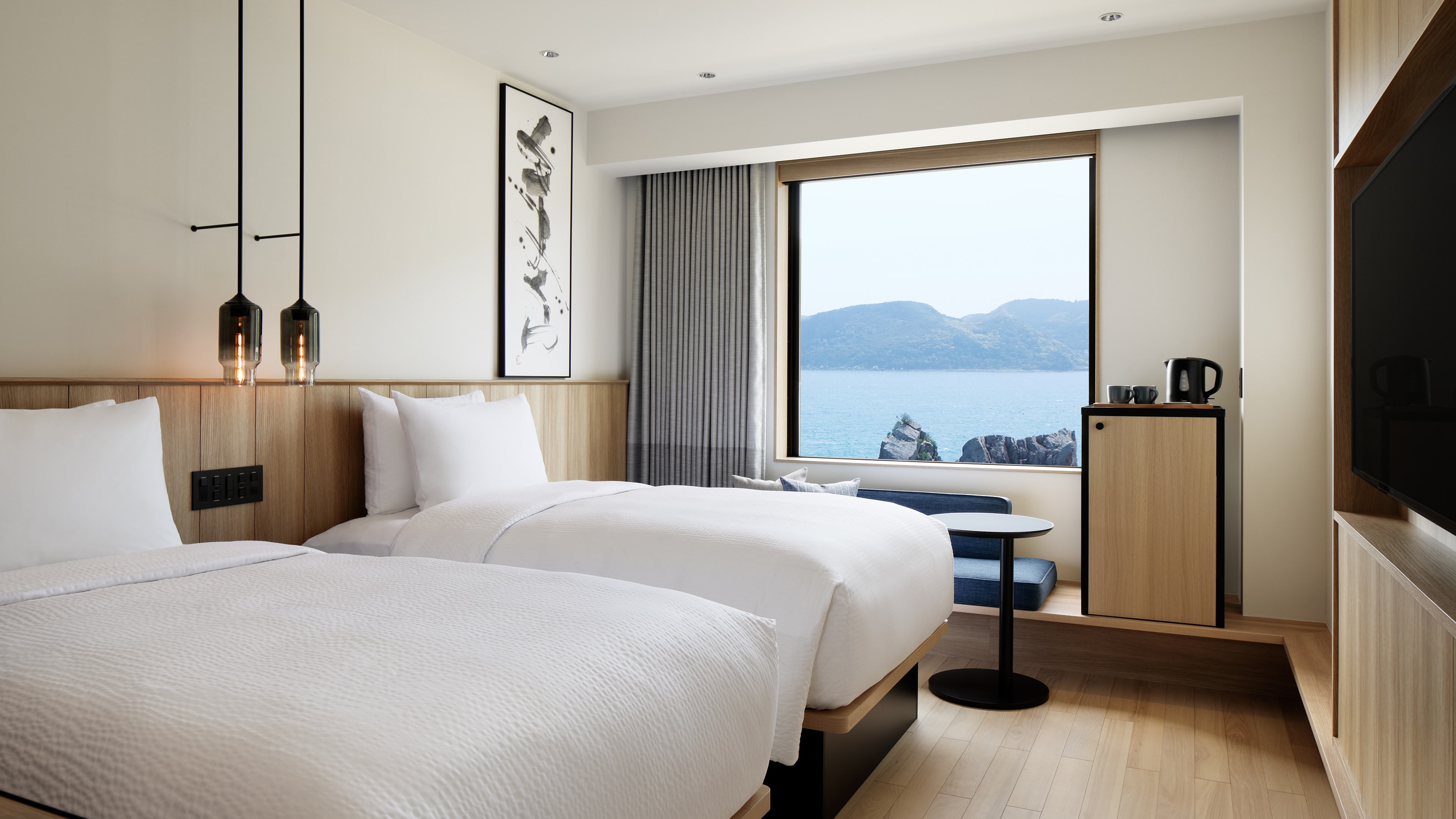 Ocean view twin room: 25 square meters, non-smoking, bed width 120 cm. Enjoy a relaxing moment in a room with a sea view.