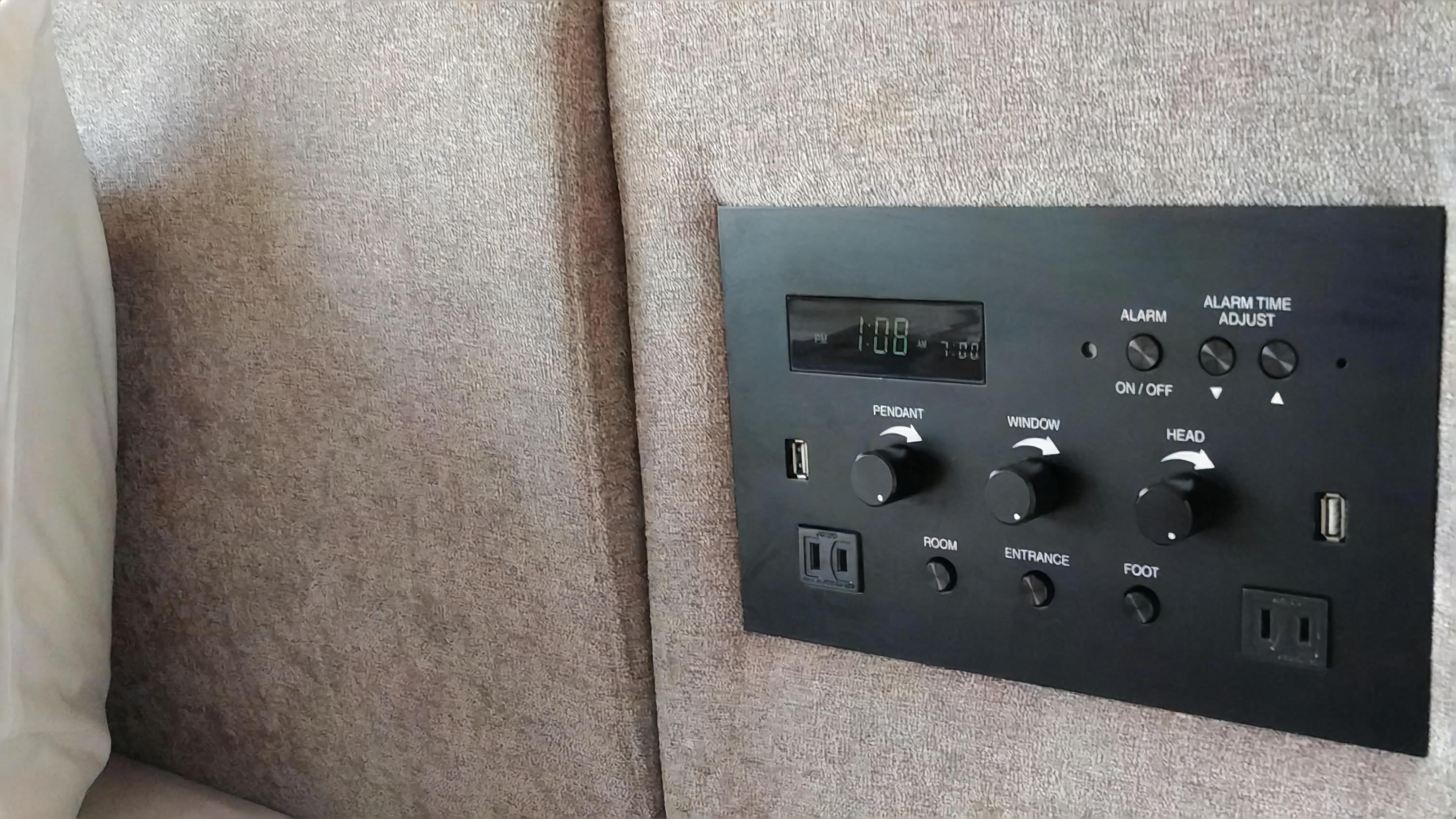 The bedside control panel also has an outlet and a USB port, so you can charge while sleeping.