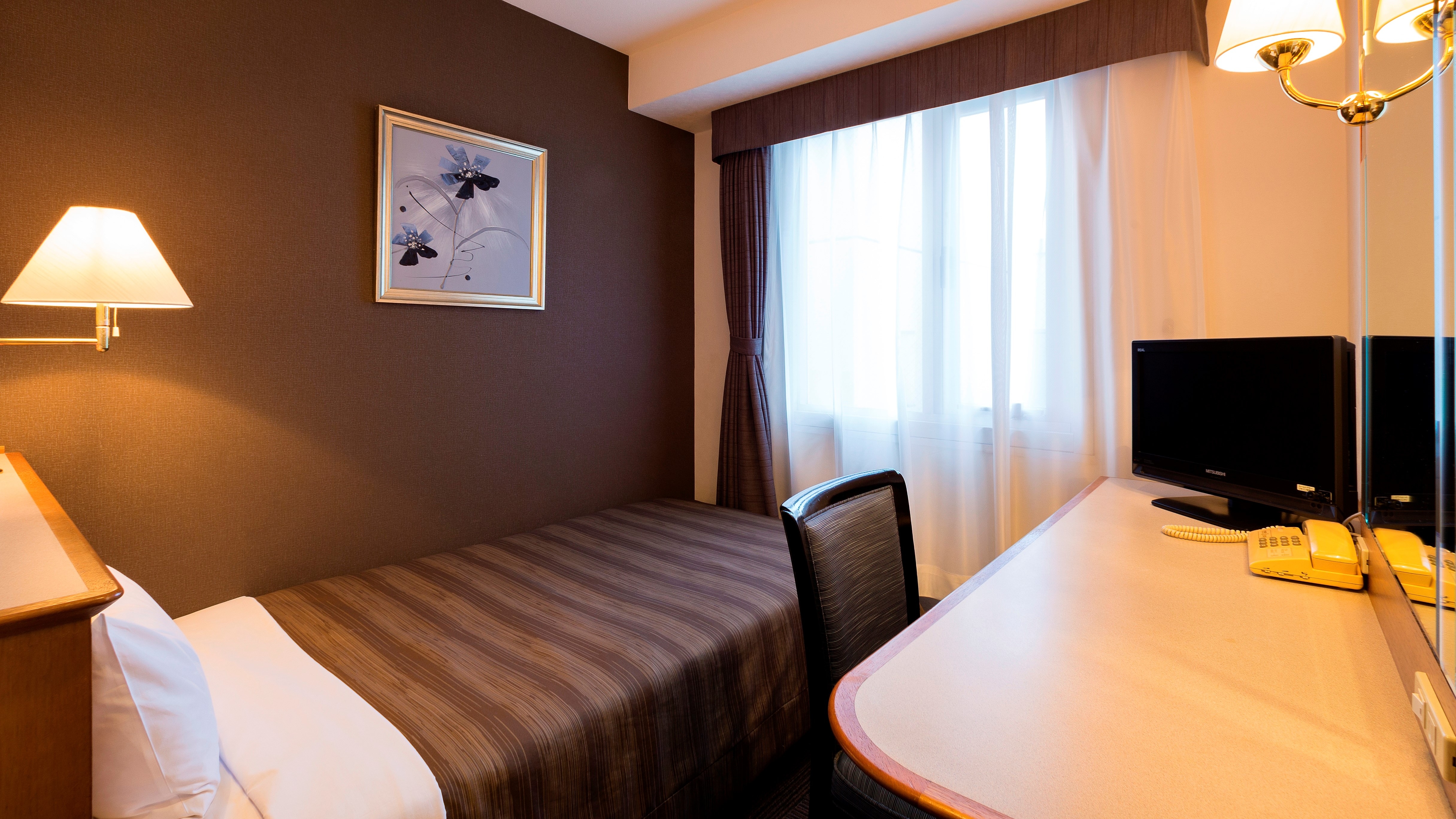 Single C (11 meter persegi, lebar tempat tidur 110 cm)